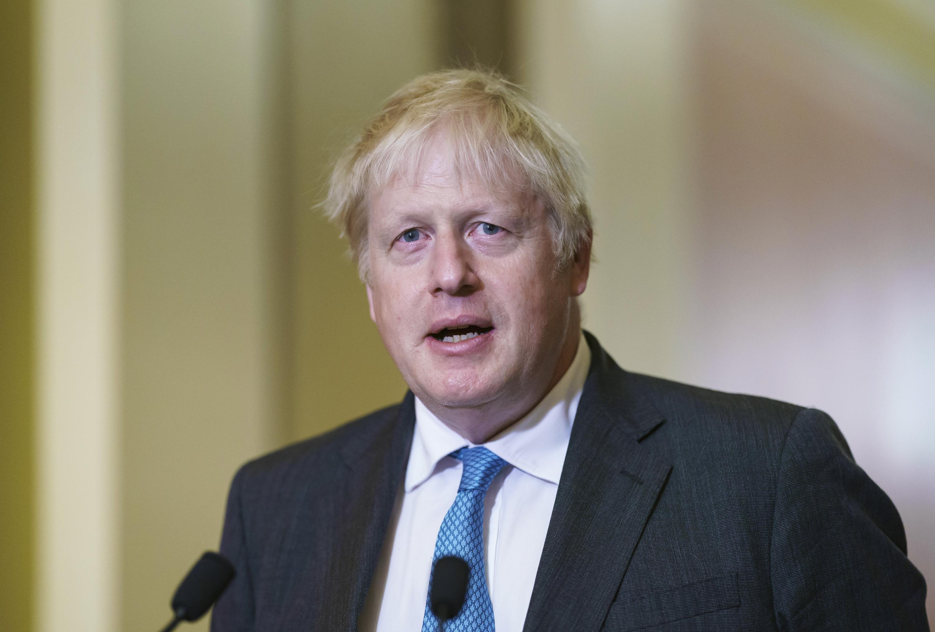 grow-up-uk-s-johnson-says-world-must-face-climate-change-ap-news