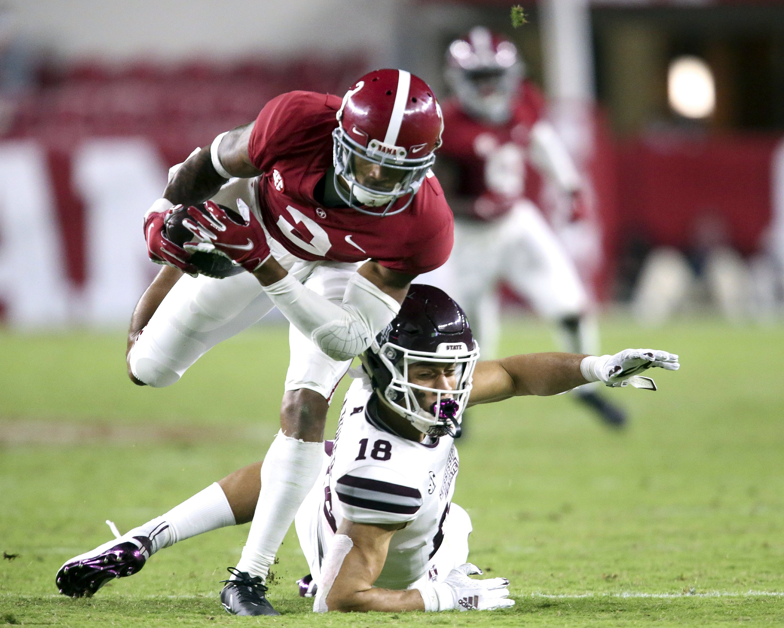 Surtain shows off speed on Alabama's competitive pro day AP News