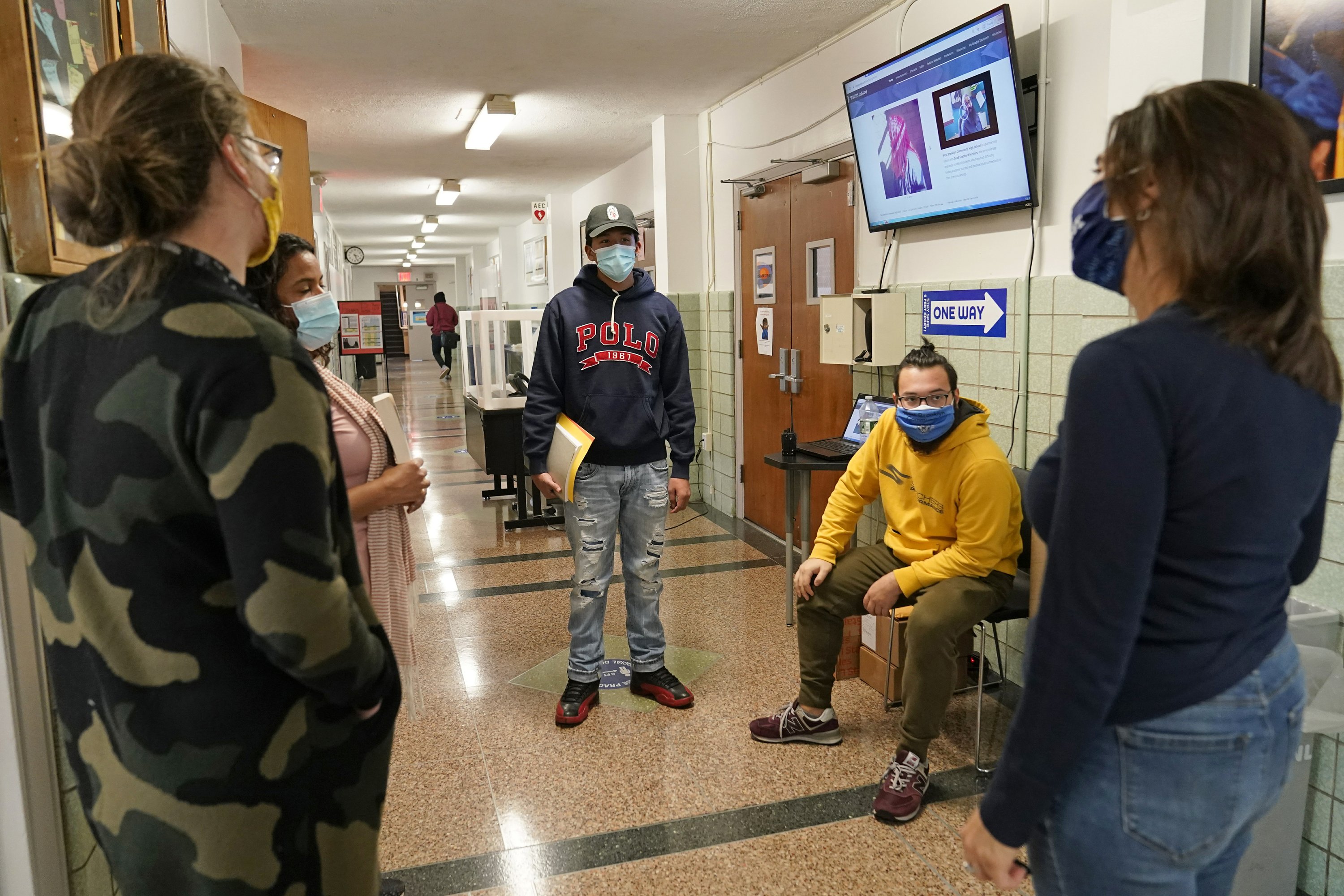 New York City schools to close again as virus rate rises | AP News