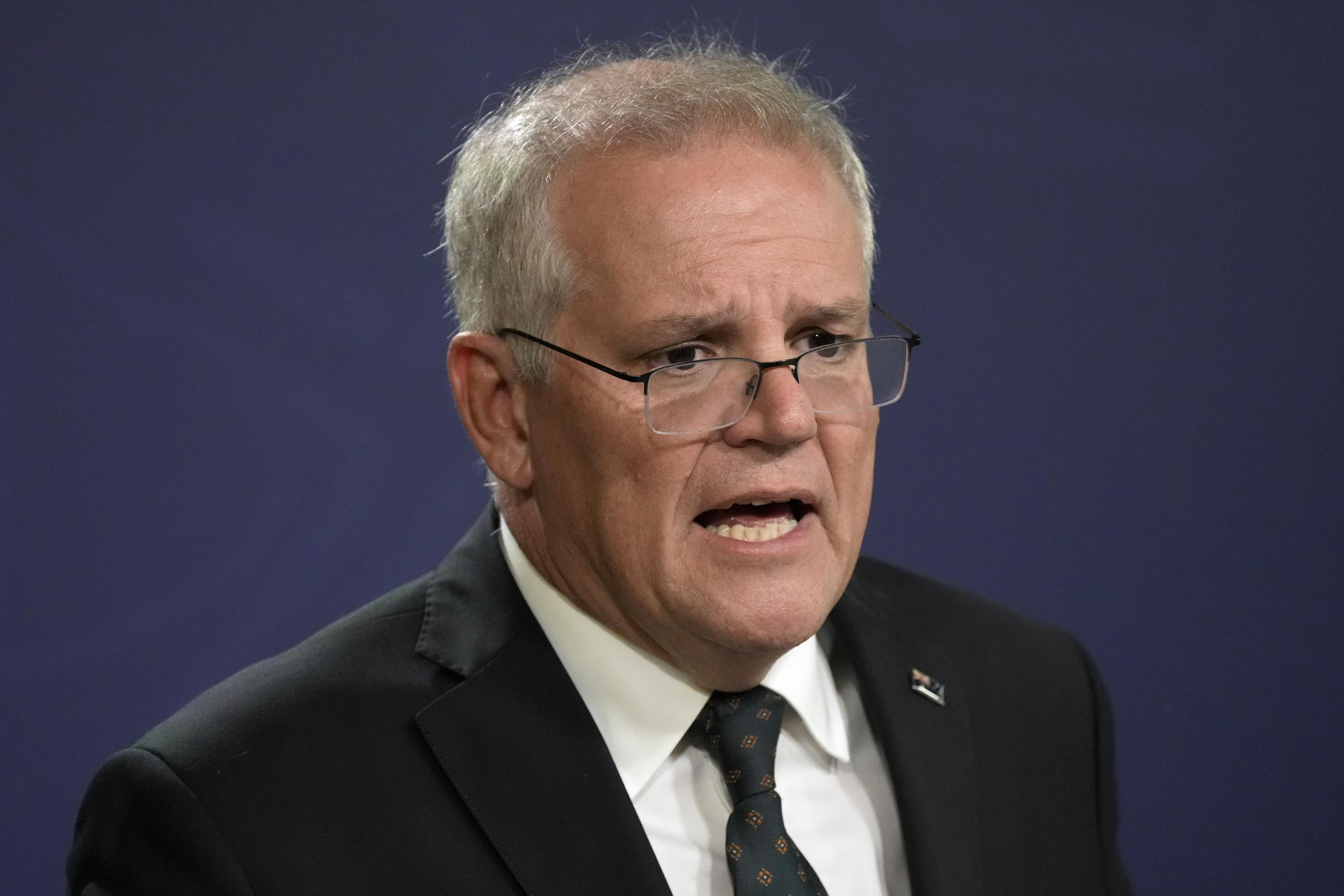 Former Australian PM on powers in secret | AP News