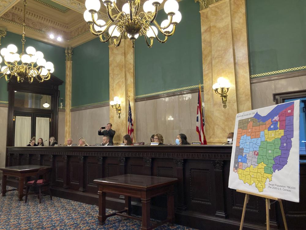 Members of the Ohio Senate Government Oversight Committee hear testimony on a new map of state congressional districts on Tuesday, Nov. 16, 2021, at the Ohio Statehouse in Columbus, Ohio. (AP Photo/Julie Carr Smyth)