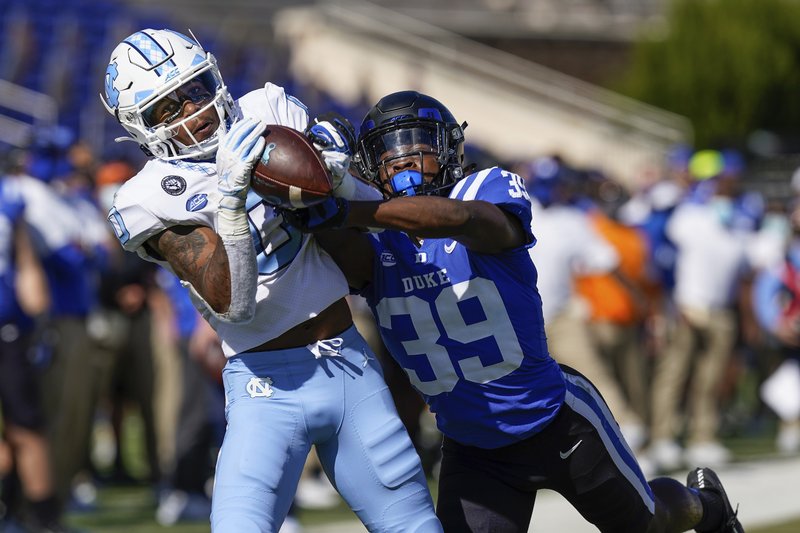 Javonte Williams scores four TDs as Tar Heels rout Duke 56-24 Javonte Williams scores four TDs as Tar Heels rout Duke 56-24