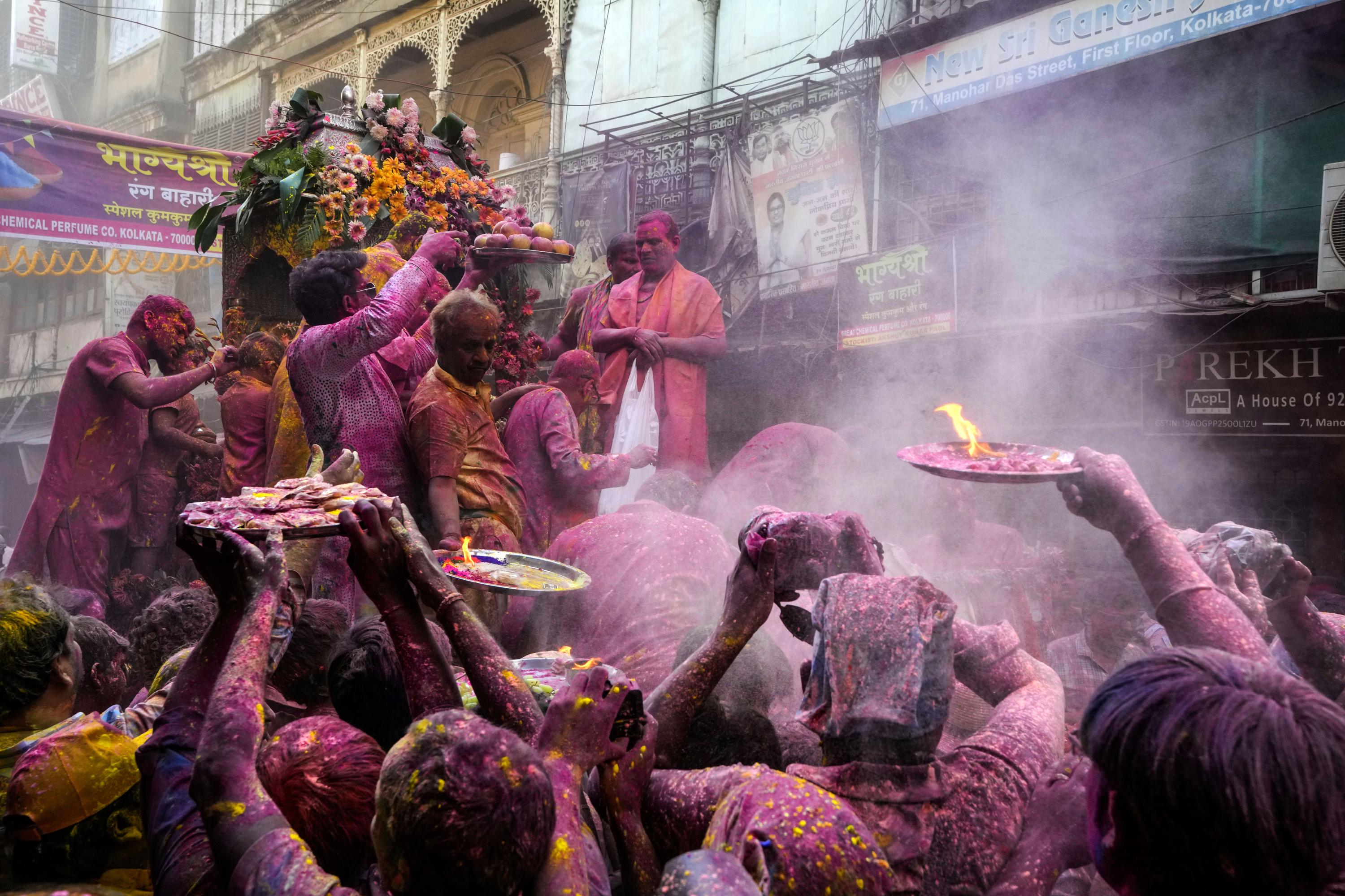 AP PHOTOS: Indians celebrate Holi, Hindu festival of color