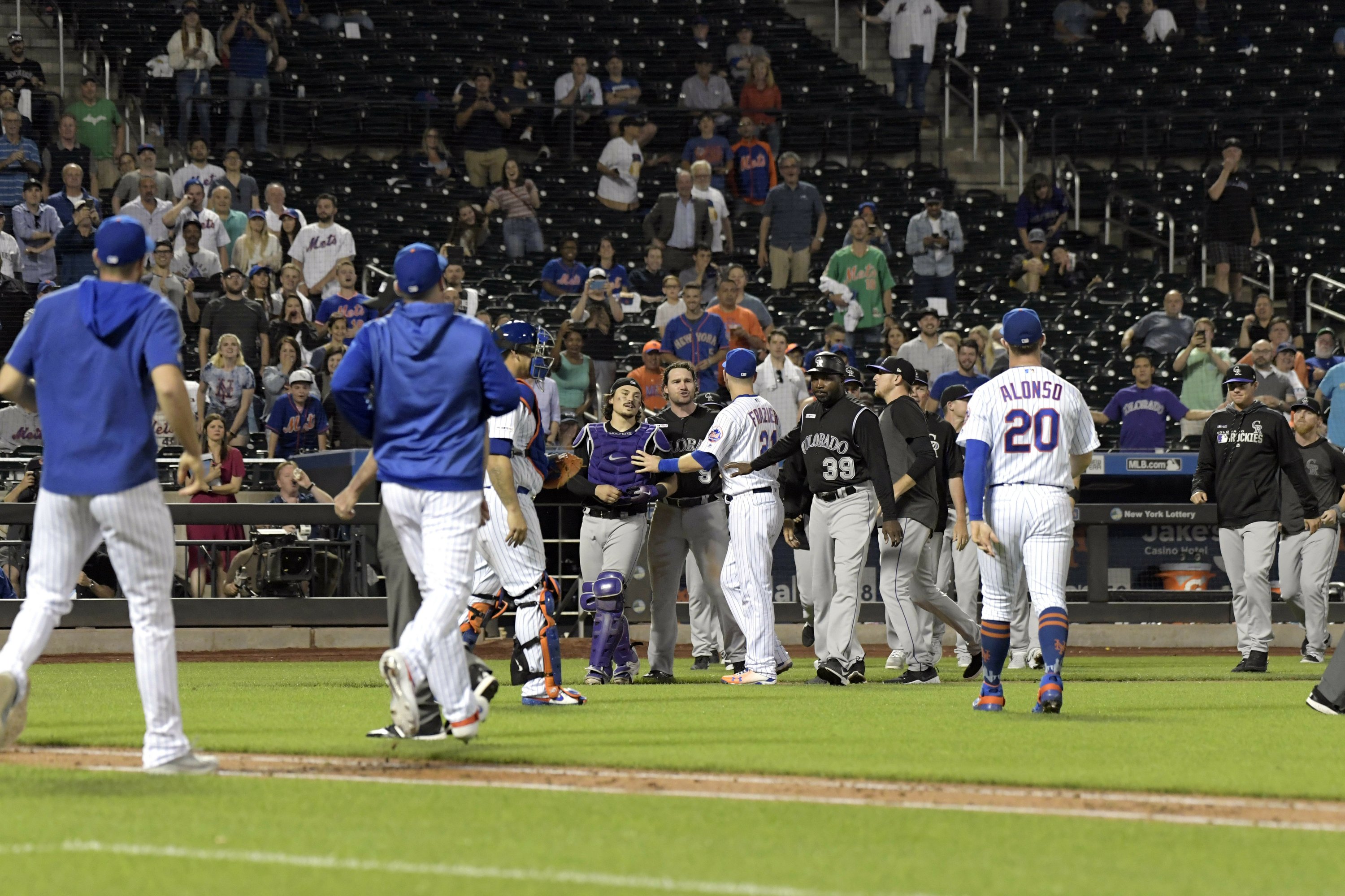 Murphy homers, benches clear, Rockies top Mets 51 AP News