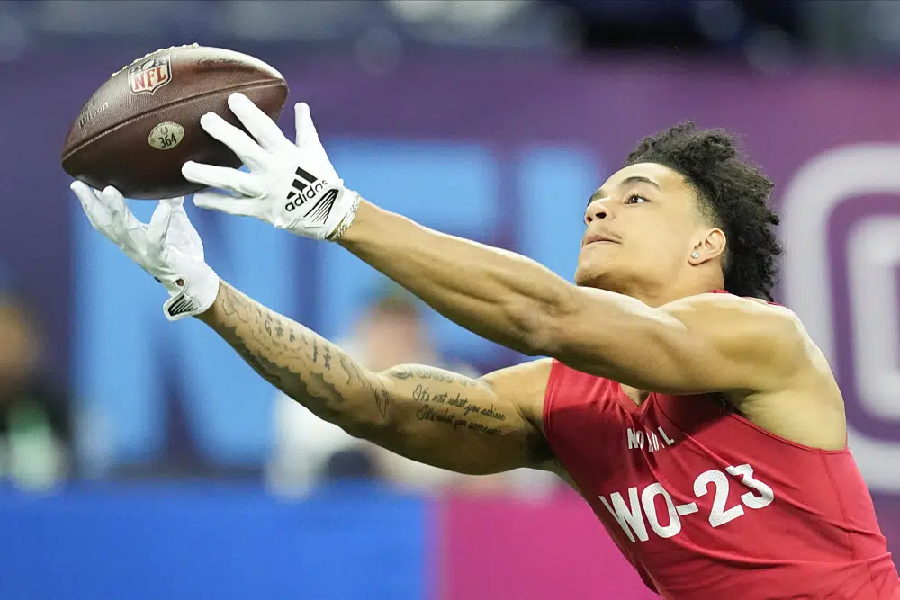 Tennessee wide receiver Jalin Hyatt runs a drill at the NFL football scouting combine in Indianapolis, Saturday, March 4, 2023. (AP Photo/Darron Cummings)