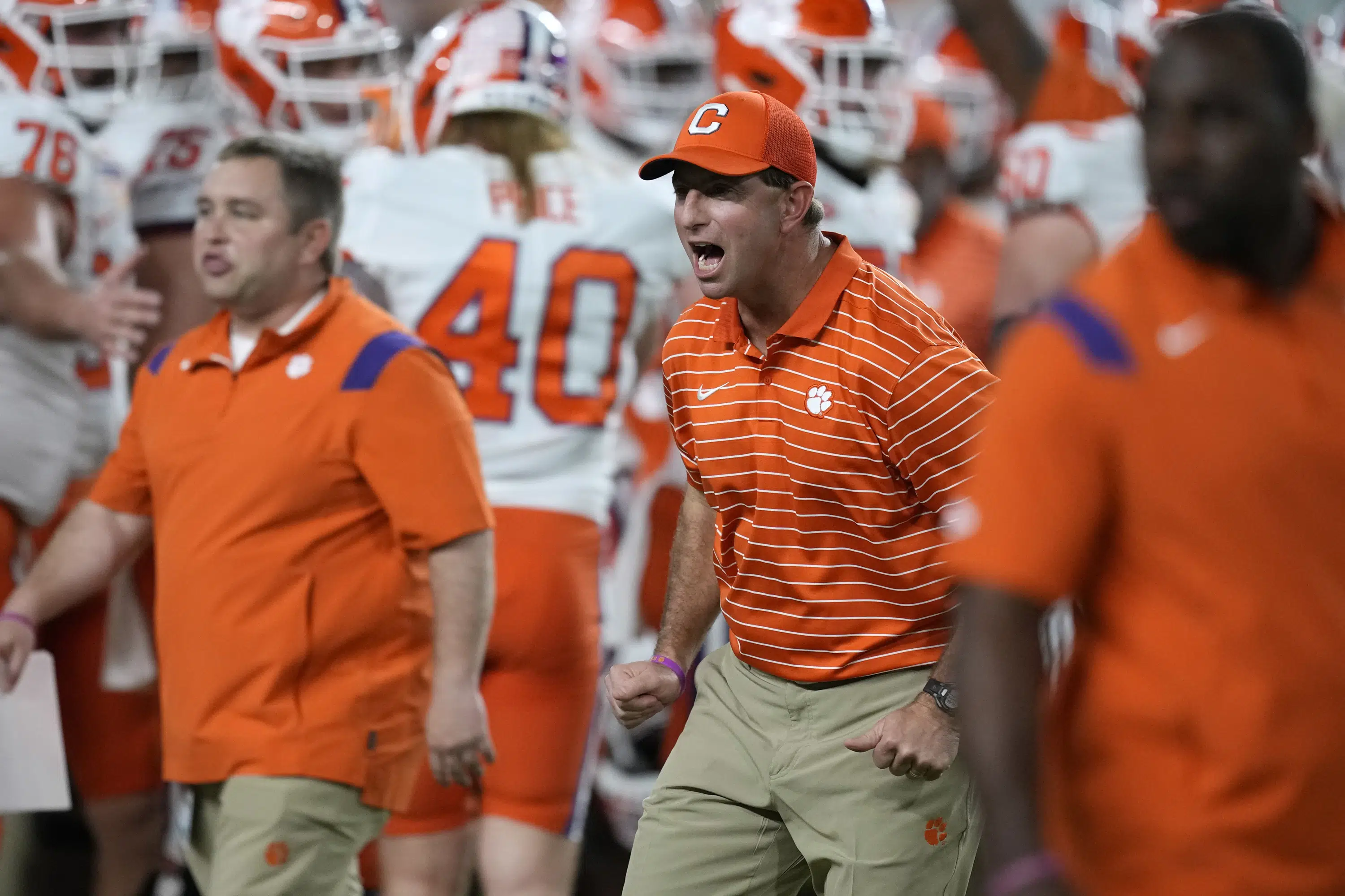 Clemson hires TCU OC Riley to spark Tigers' offense | AP News