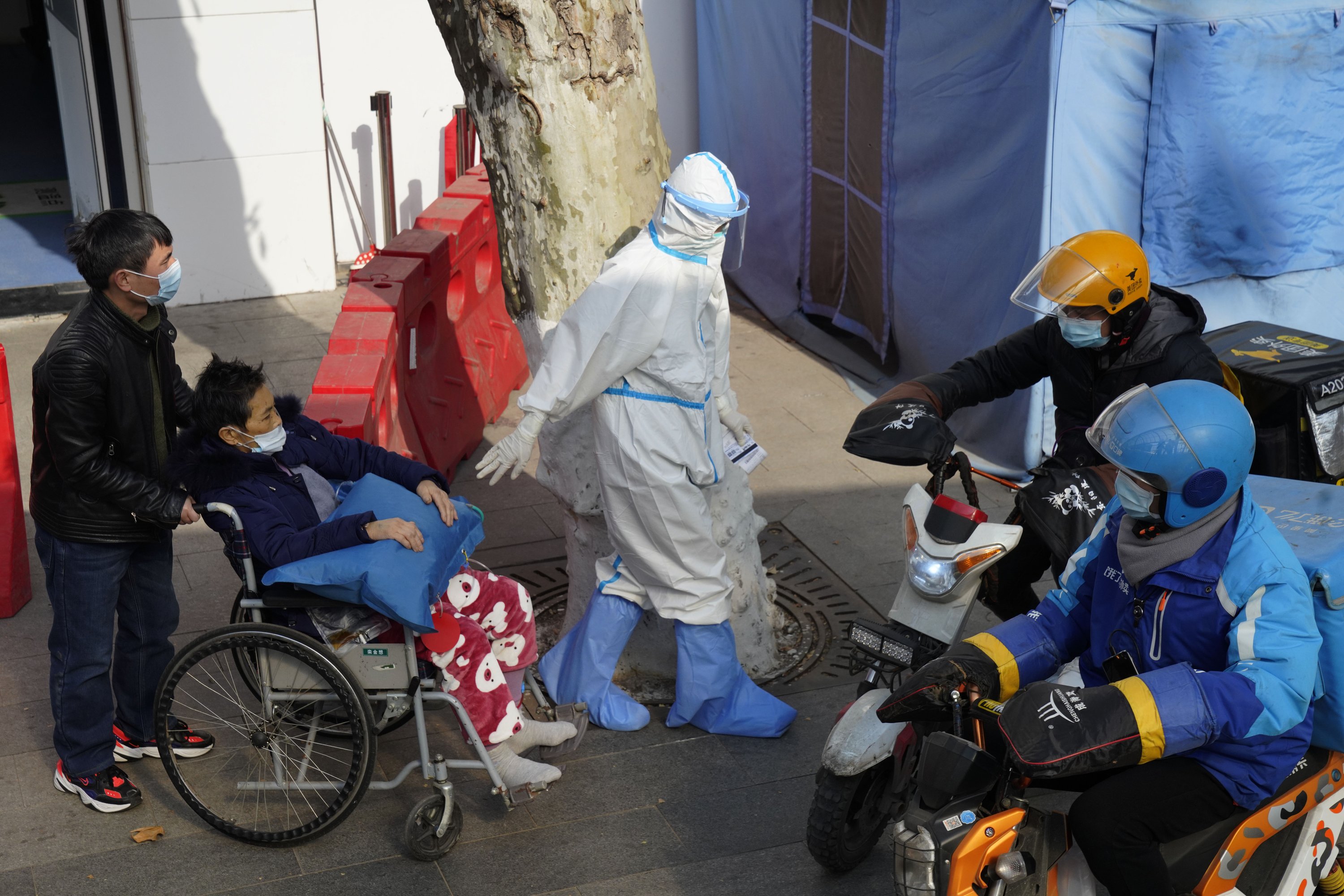 China builds new quarantine center as virus cases rise - The Associated Press