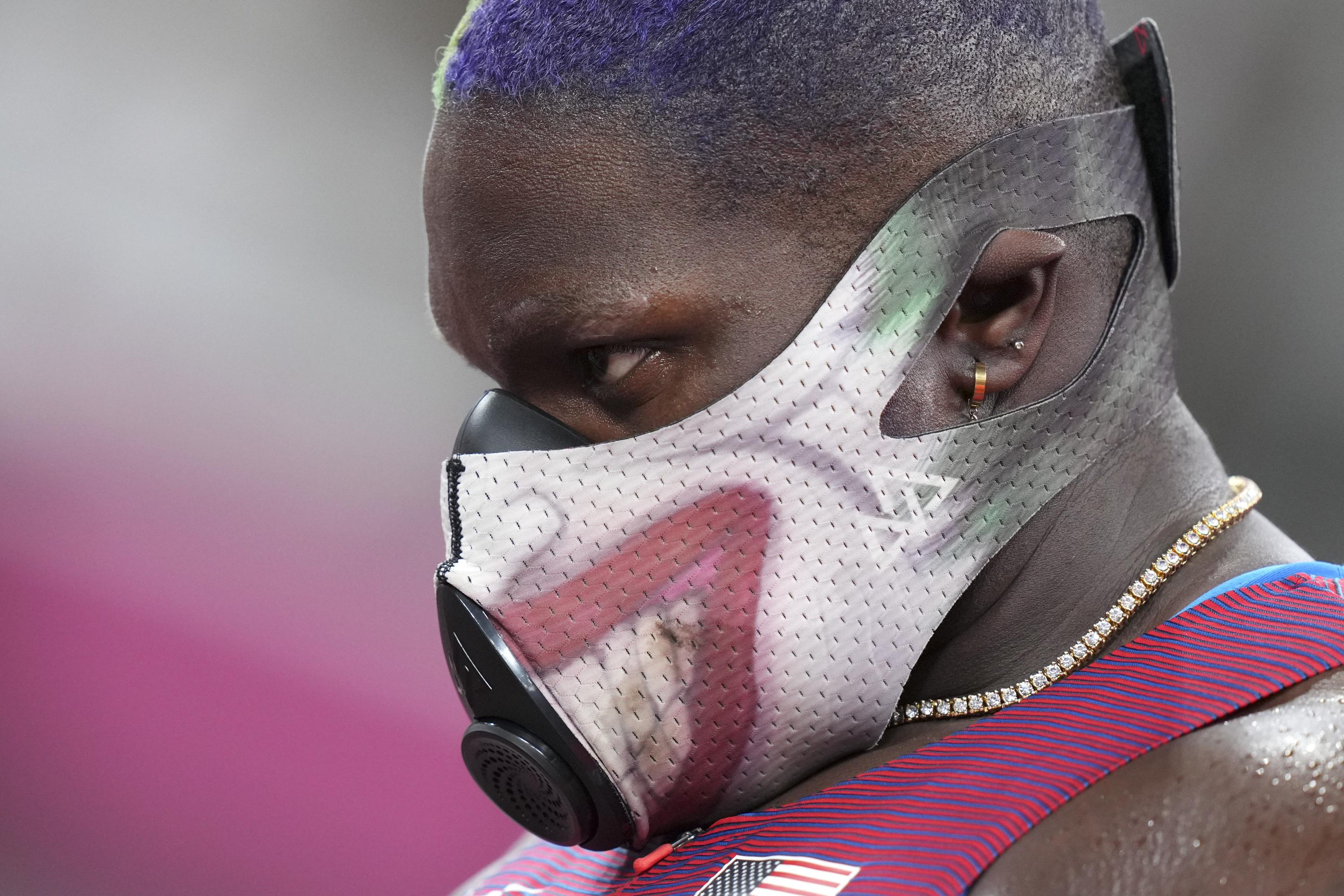 Joker S Wild Saunders Dons Mask Before Shot Put At Olympics Ap News