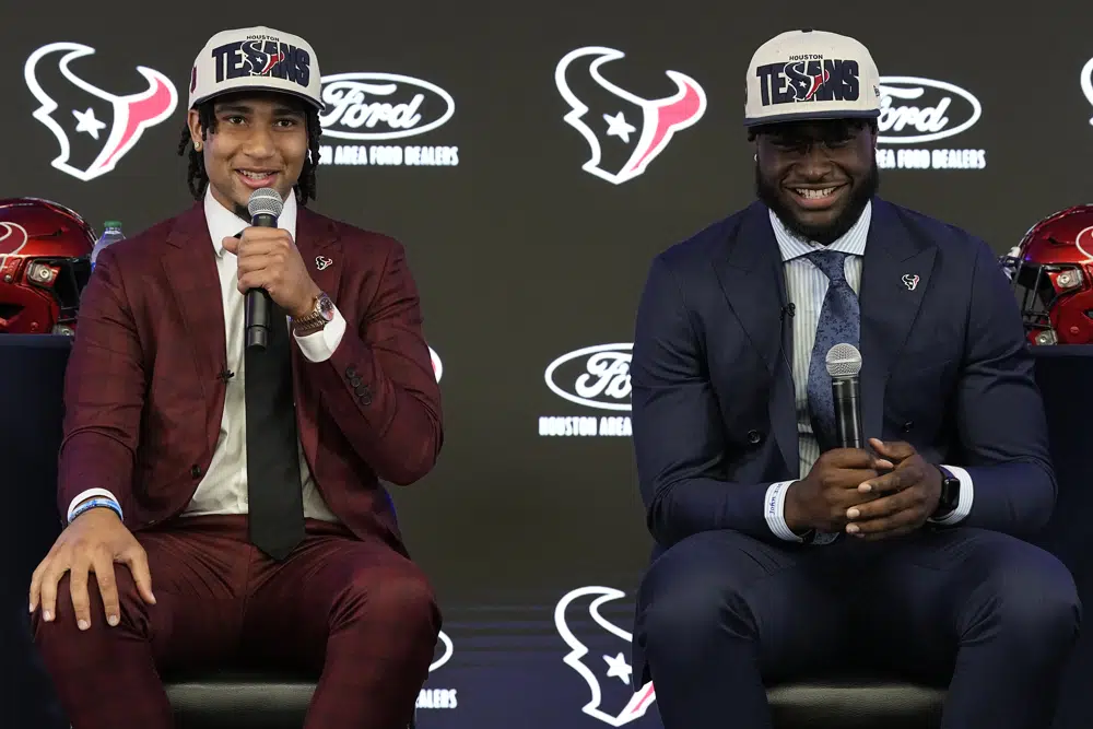 Houston Texans first round draft picks quarterback C.J. Stroud, left, and linebacker Will Anderson Jr. speak during an introductory NFL football press conference, Friday, April 28, 2023, in Houston.. (AP Photo/Kevin M. Cox)