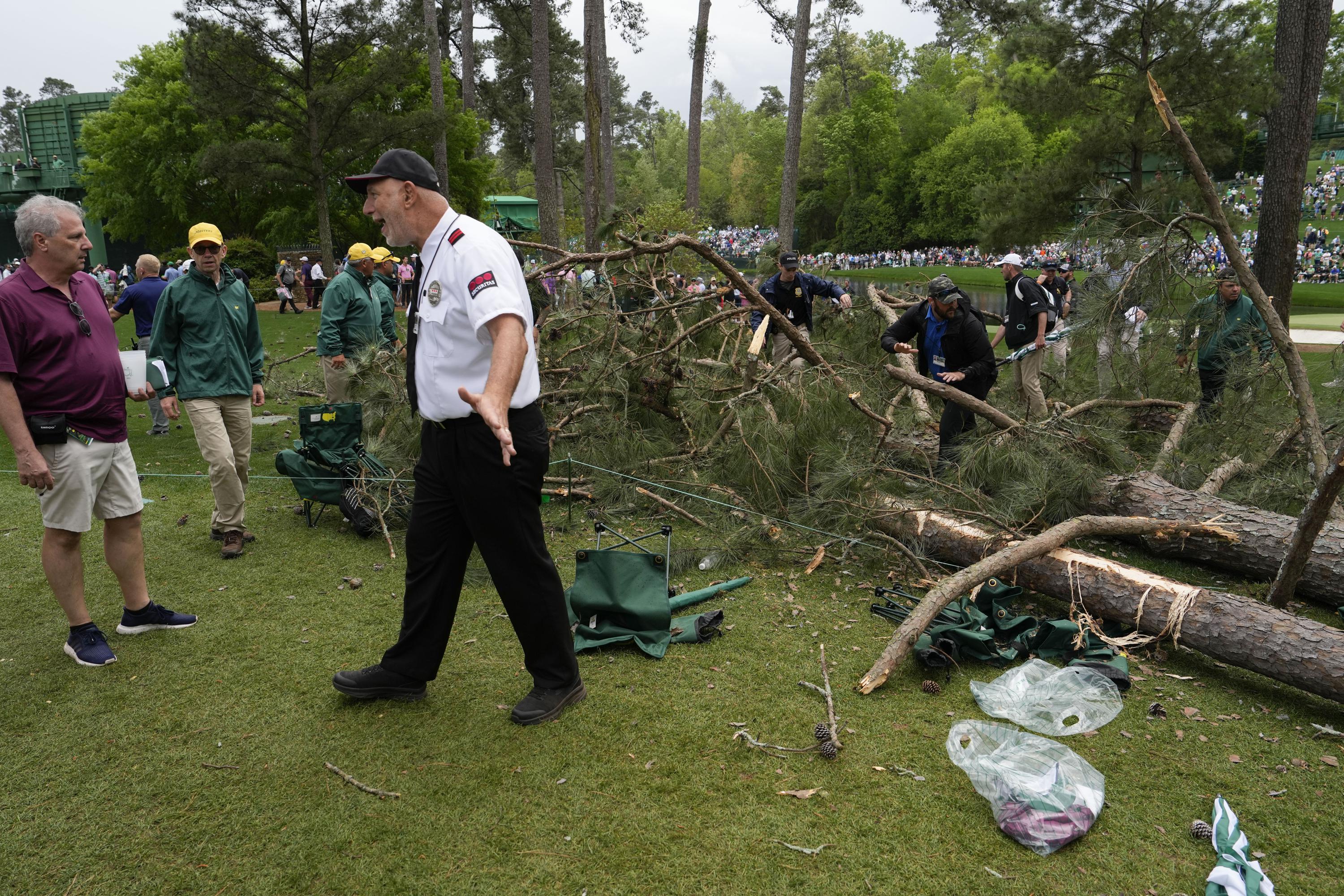 Masters second round suspended for day after strong storms down trees