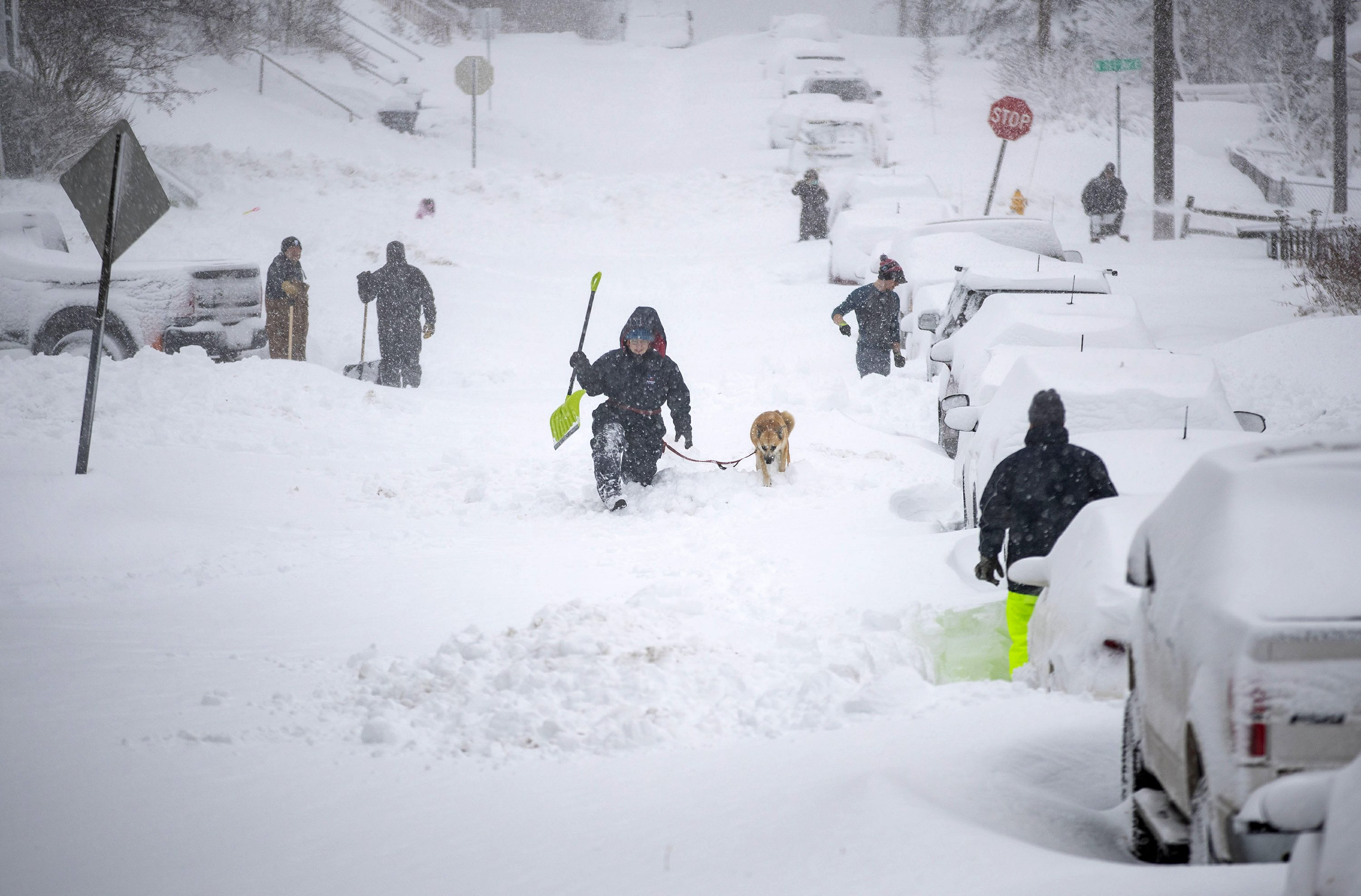 Duluth residents digging out from whopper of snowstorm AP News