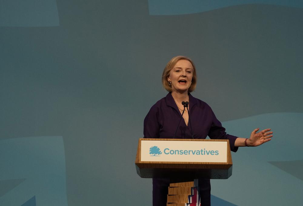 British lawmaker Liz Truss speaks after winning the Conservative Party leadership contest at the Queen Elizabeth II Centre in London, Monday, Sept. 5, 2022. Liz Truss will become Britain's new Prime Minister after an audience with Britain's Queen Elizabeth II on Tuesday Sept. 6. (AP Photo/Frank Augstein)