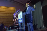 Democratic U.S. Sen Raphael Warnock speaks to the Democratic Party of Georgia state convention on Saturday, Aug. 27, 2022 in Columbus, Ga. Warnock is seeking a full six-year term in November, with Republican Herschel Walker as his top opponent. (AP Photo/Jeff Amy)