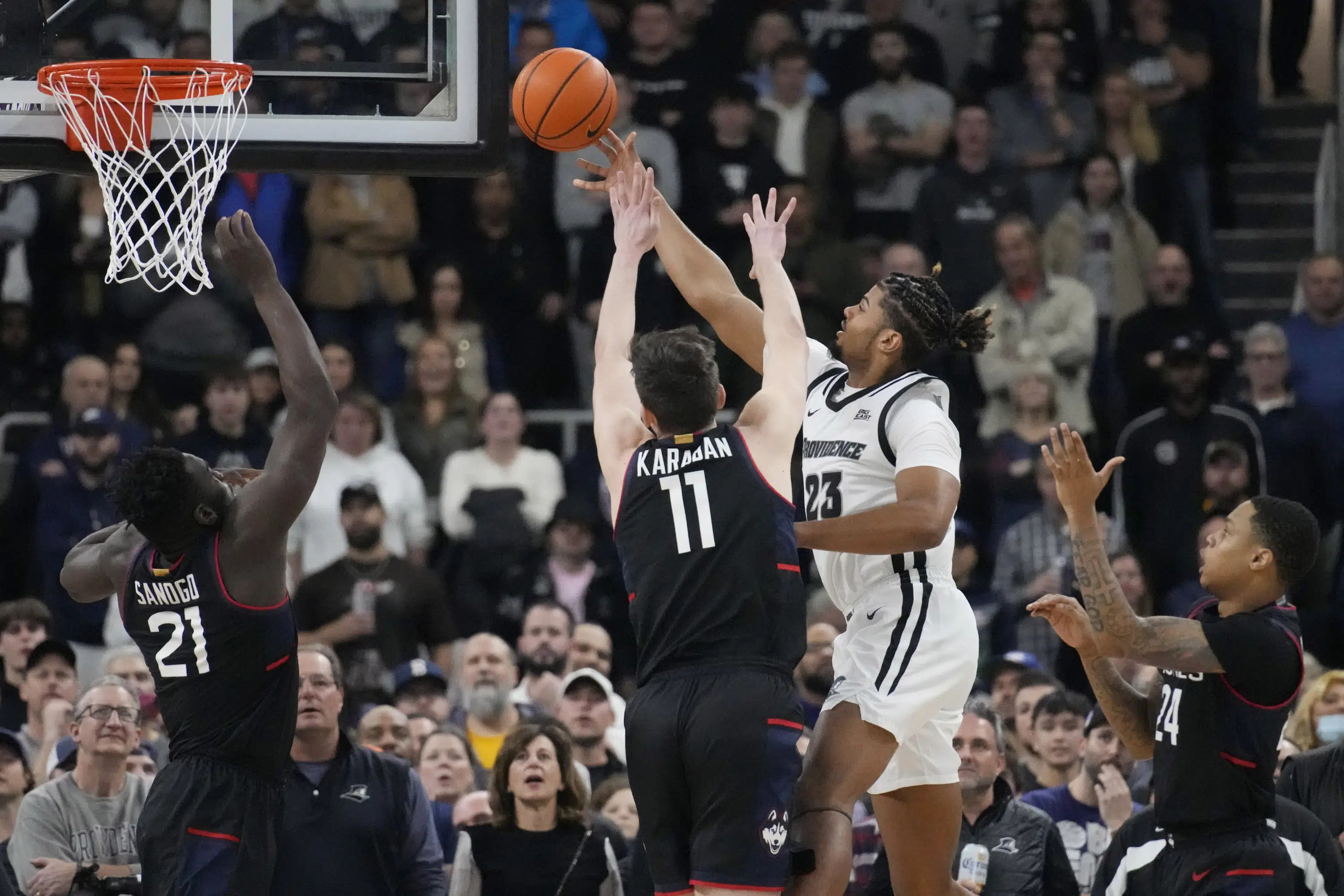 Hopkins scores 27 to help Providence beat No. 4 UConn 73-61