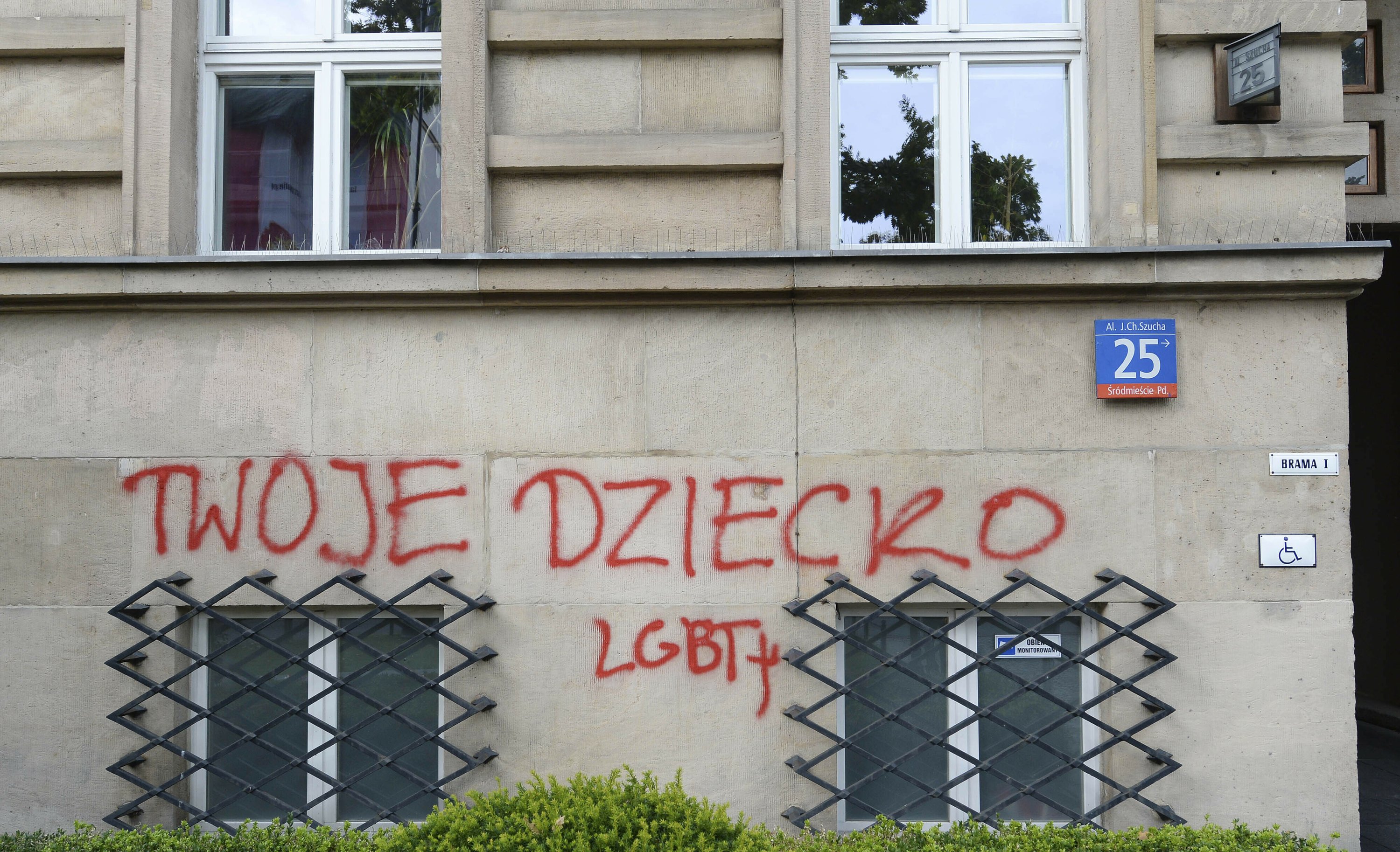 Under fire over LGBT rights, Polish leader blames activist