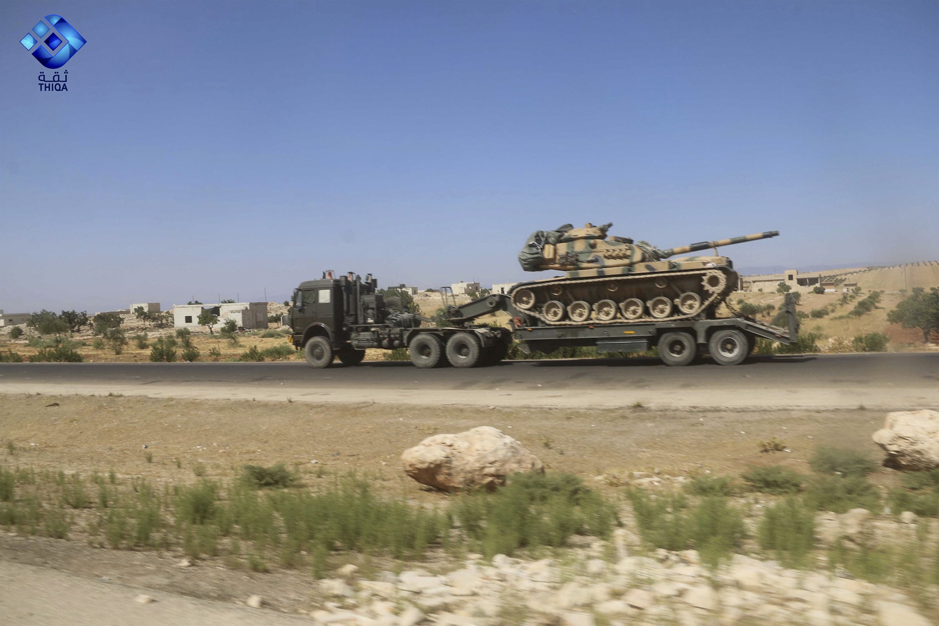 Militants leave key rebel town as Syrian troops push in Militants leave key rebel town as Syrian troops push in