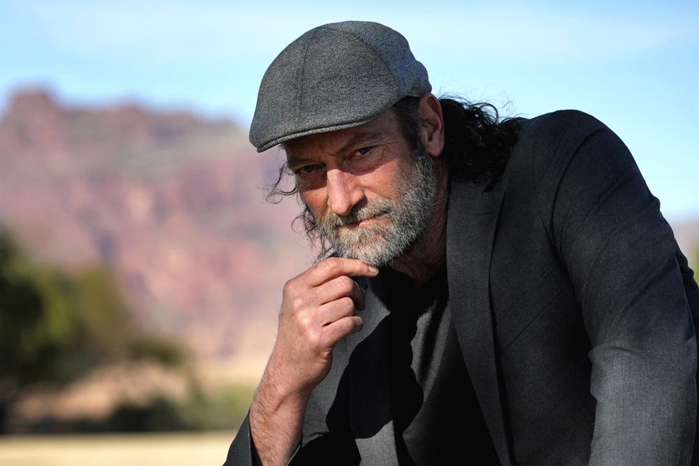 Troy Kotsur, nominated for an Oscar for best supporting actor for his role in the film "CODA," poses for a photo at Red Rock Park in Mesa, Ariz., on Jan. 28, 2022. (AP Photo/Matt York)