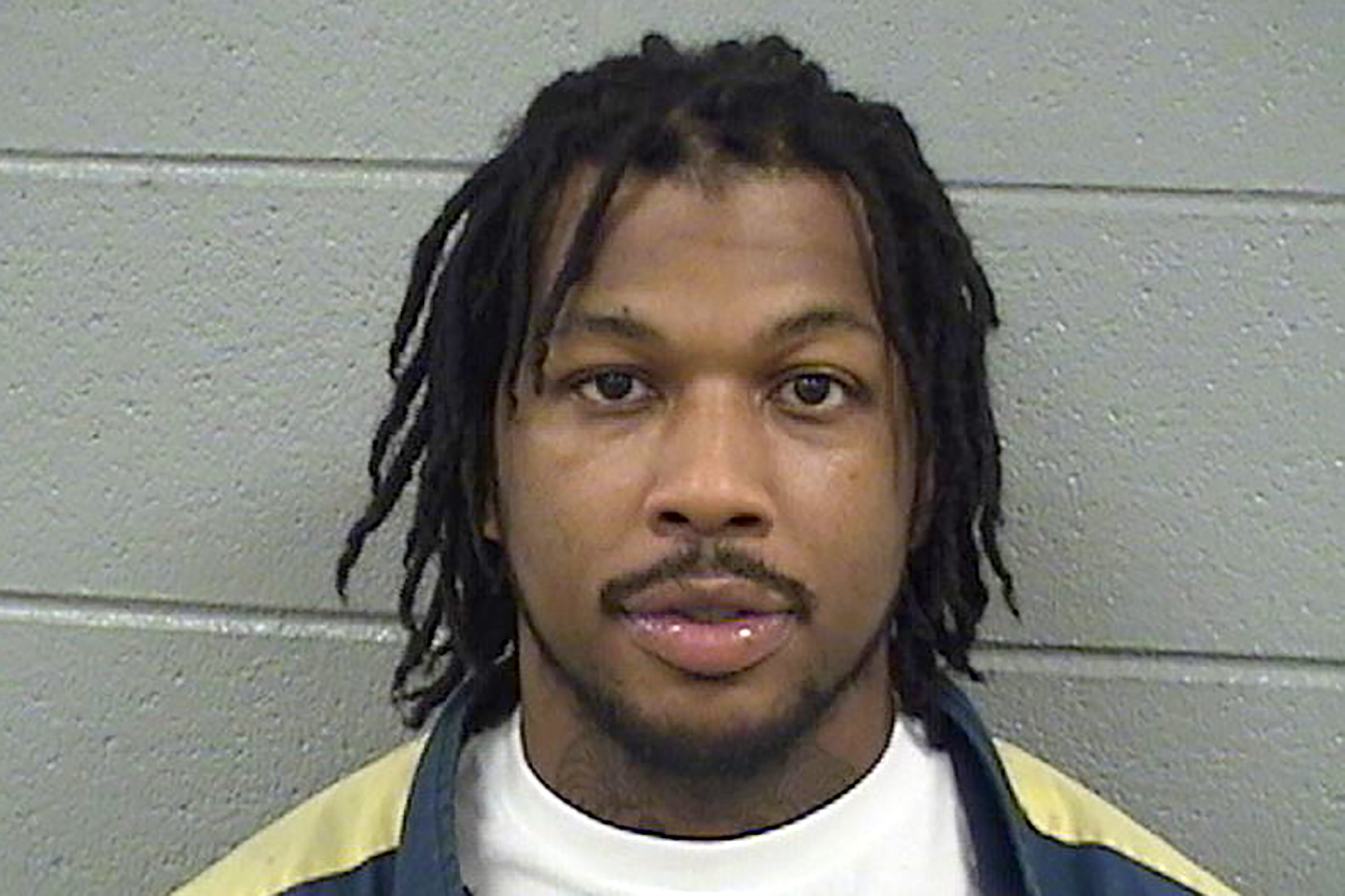 Cook County Jail detainee accused of attacking three guards | AP News