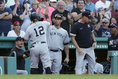 Odor, Yankees rally in 8th, end Boston 