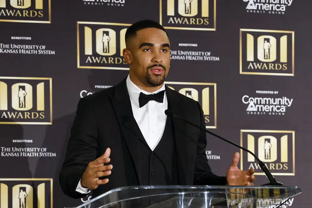 Philadelphia Eagles quarterback Jalen Hurts, recipient of the NFC Offensive Player of the Year award, talks about his season during an NFL football news conference prior to the annual 101 Awards gala, Saturday, Feb. 25, 2023, in Kansas City, Mo. (AP Photo/Colin E. Braley)