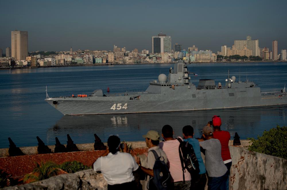 FILE - Russian Navy Admiral Gorshkov frigate arrives at the port of Havana, Cuba, June 24, 2019. When the Admiral Gorshkov sailed into Havana in 2019 shortly after entering into service, it was billed as Russia's most advanced battleship, the largest built in two decades, armed with cruise missiles, air defense systems and other weapons. But it was tailed on the goodwill tour by a Russian rescue tugboat — a sign to many that Moscow had little faith in the warship's reliability. (AP Photo/Ramon Espinosa, File)