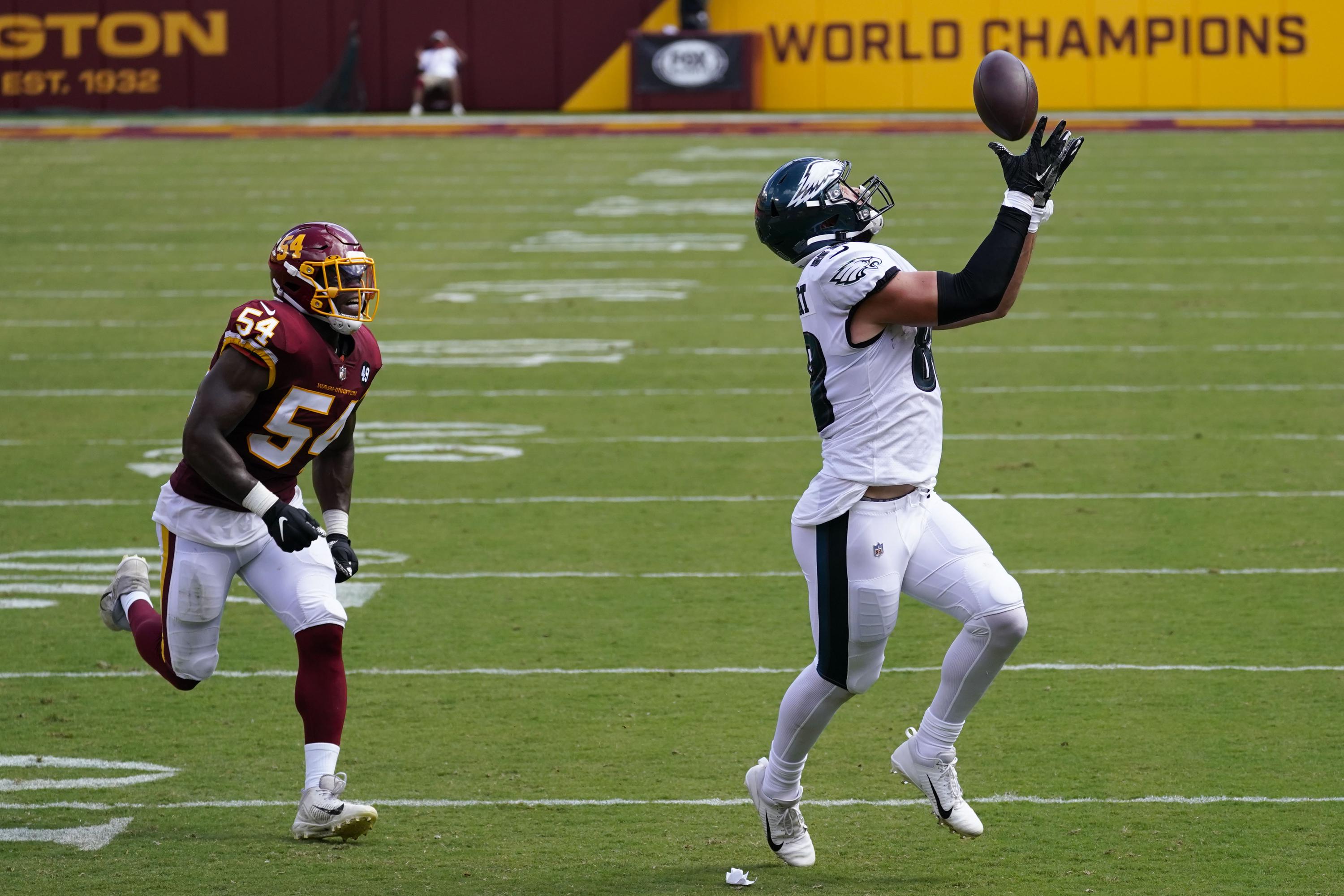 Washington gets 8 sacks, rallies for 2717 win over Eagles AP News