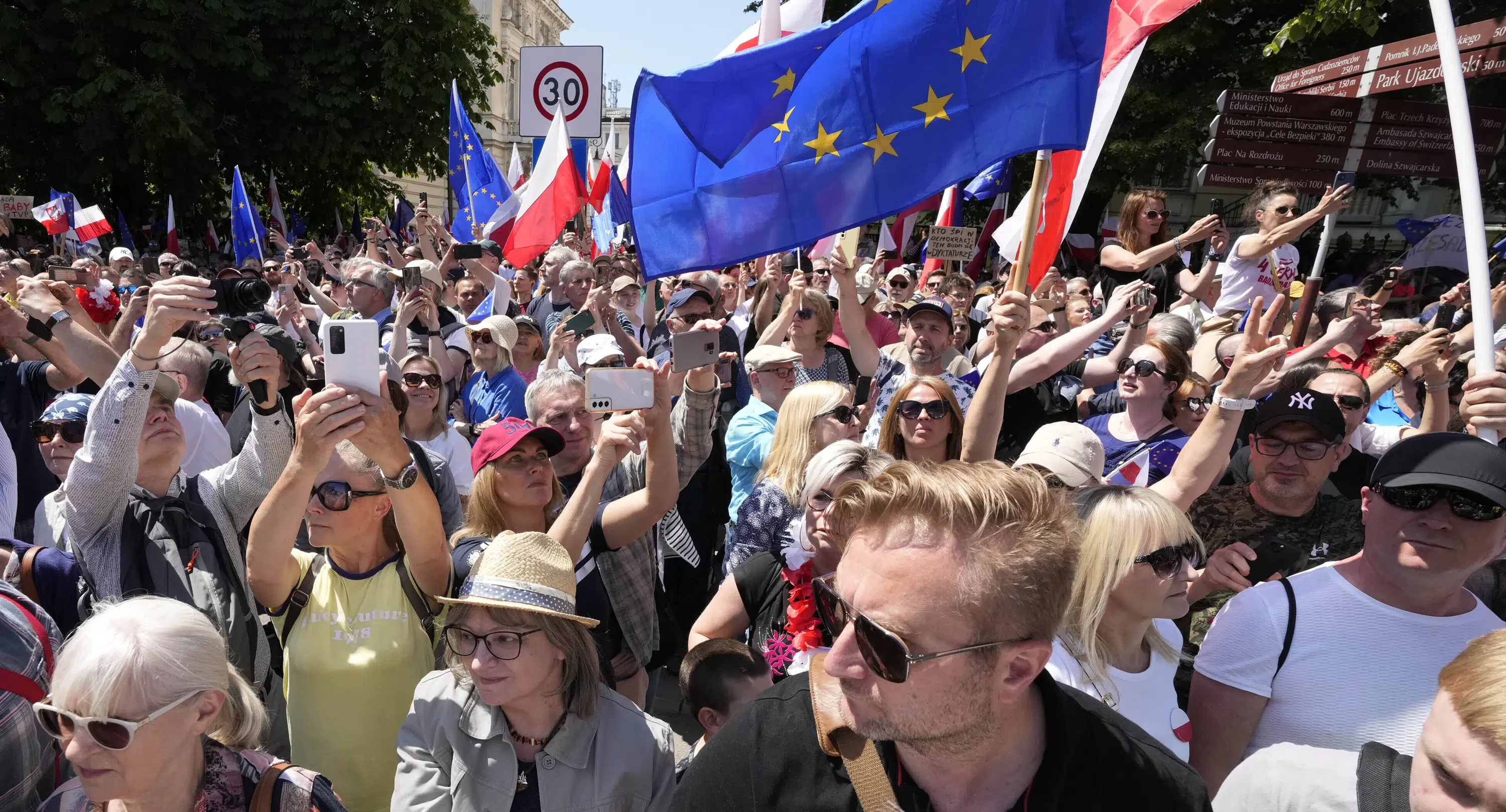 Hundreds of thousands march in Poland anti-government protests to show support for democracy