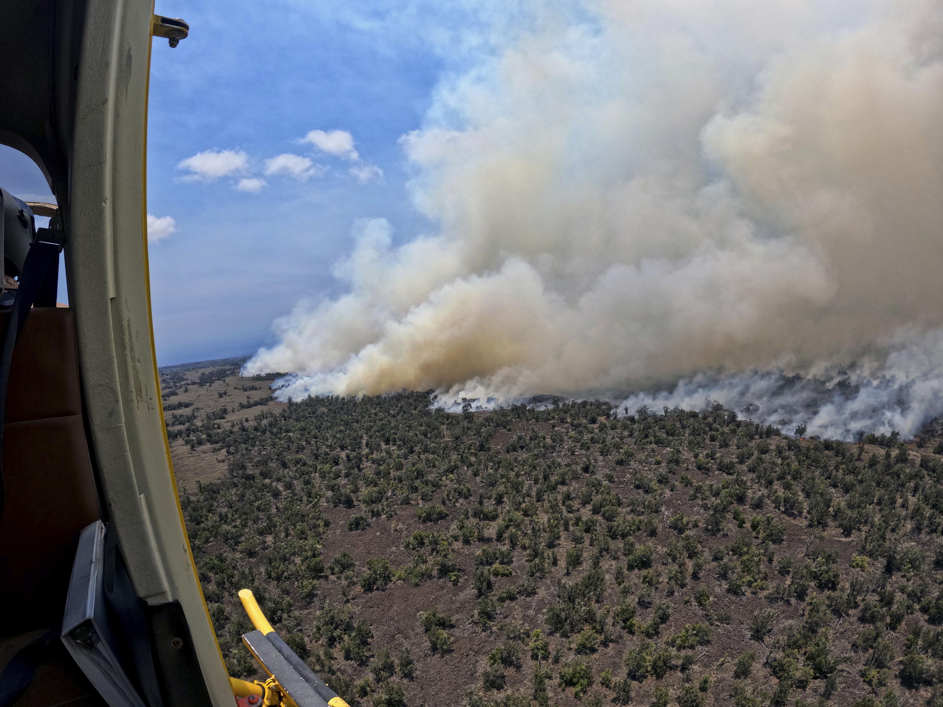 Firefighters continue battling large Hawaii wildfire AP News