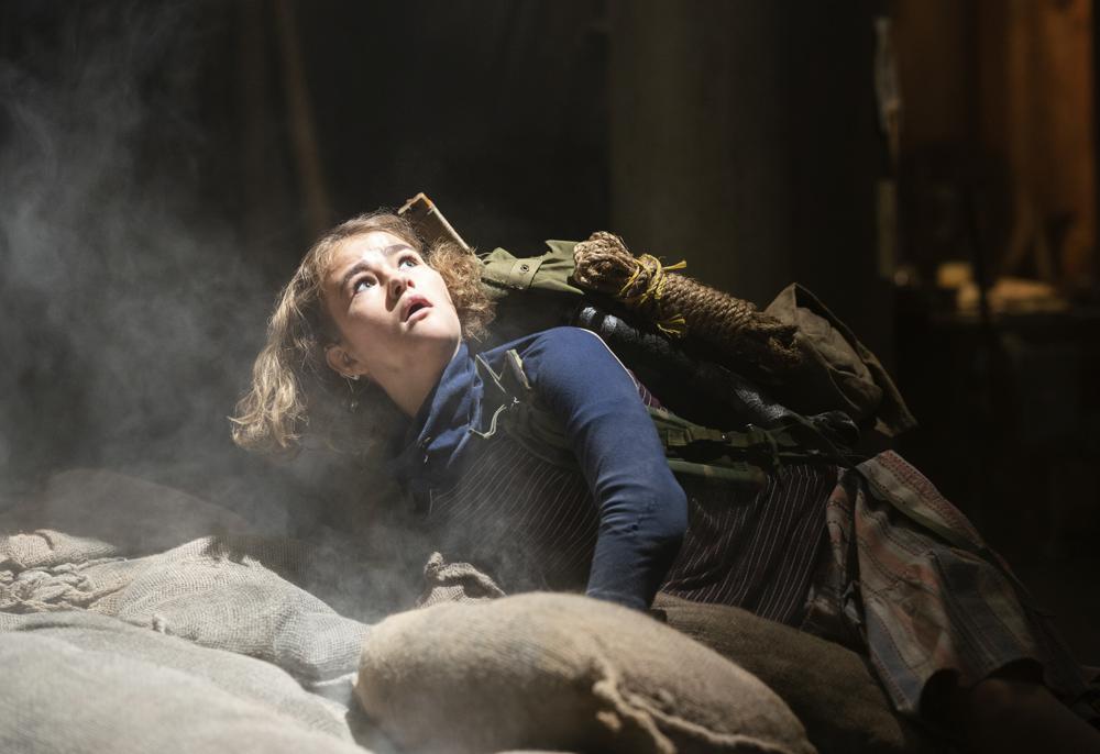 This image released by Paramount Pictures shows Millicent Simmonds in a scene from "A Quiet Place Part II." (Jonny Cournoyer/Paramount Pictures via AP)