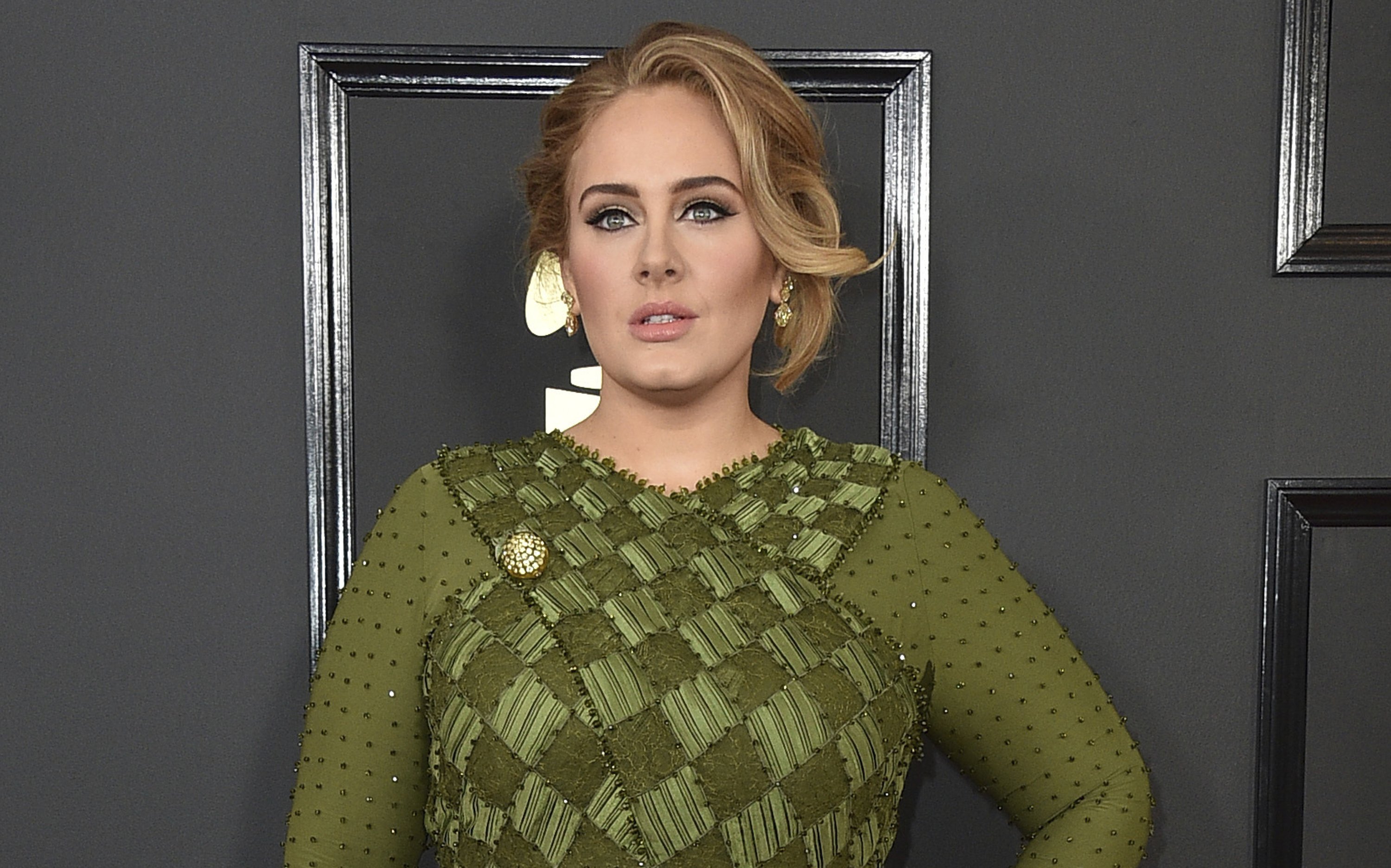 Adele says new album will explain her divorce to her young son