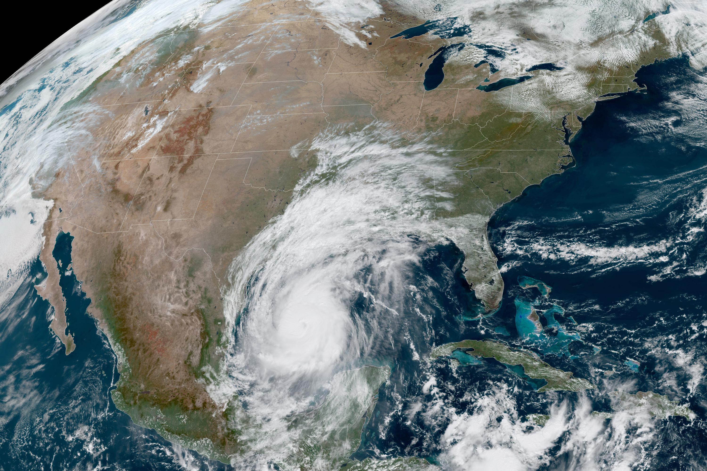 Experts: Warming makes Delta, other storms power up faster - The Associated Press