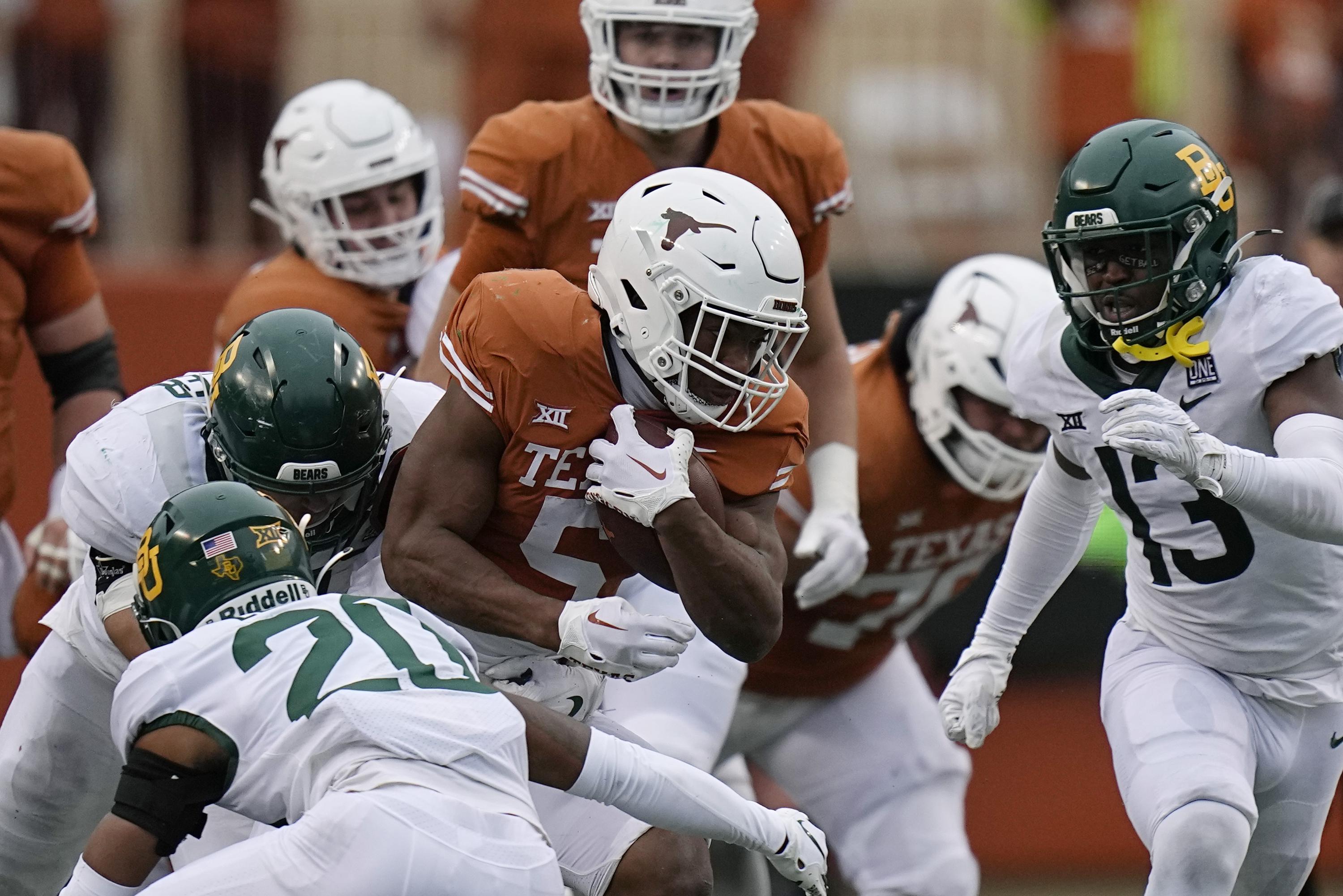 No. 24 Texas beats Baylor, keeps Big 12 title hopes alive AP News