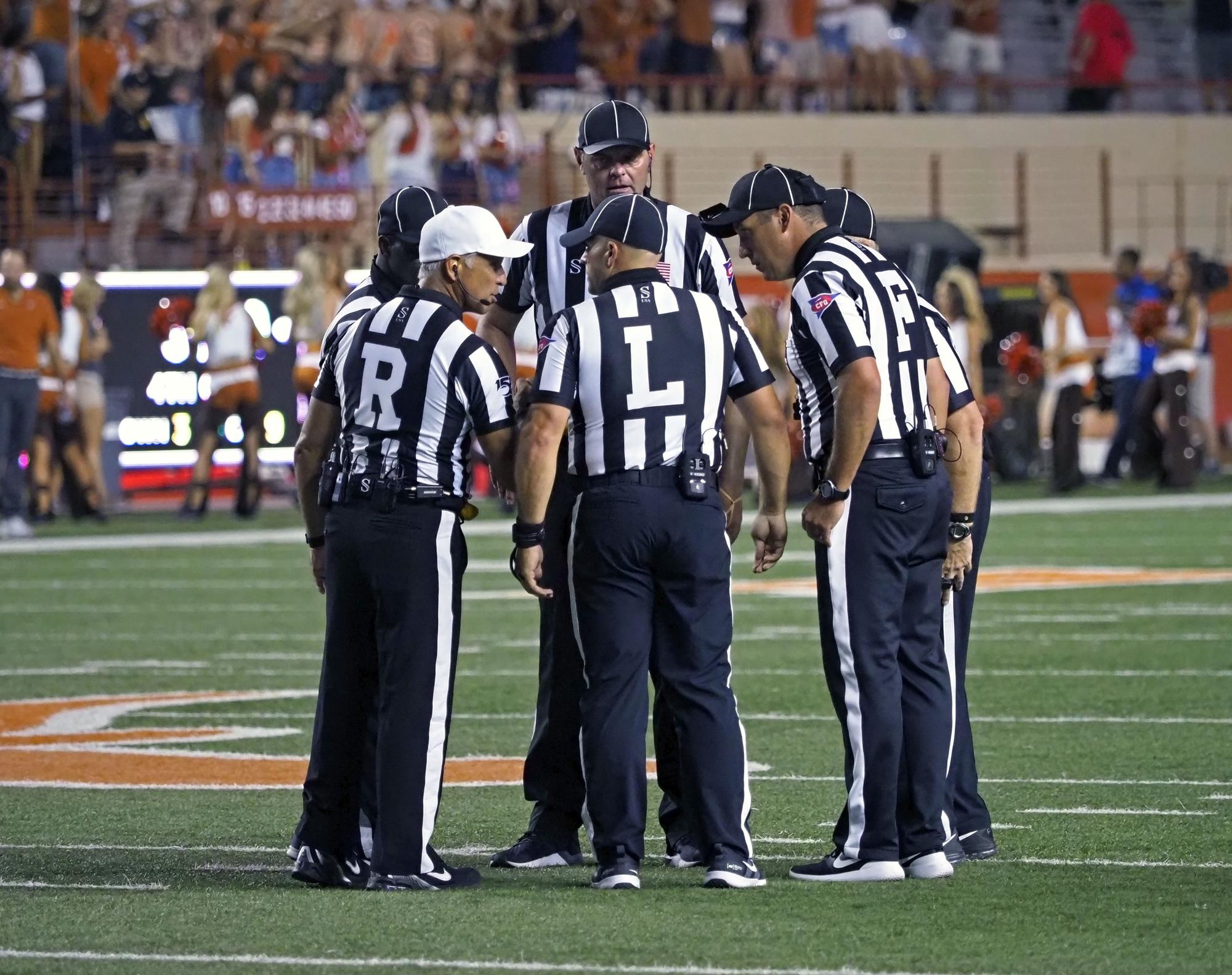 2022 NCAA rules changes address targeting, faking injuries | AP News