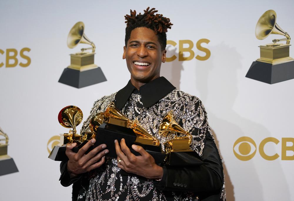 FILE - Jon Batiste, winner of the awards for best American roots performance for "Cry," best American roots song for "Cry," best music video for "Freedom," best score soundtrack for visual media for "Soul," and album of the year for "We Are," poses in the press room at the 64th Annual Grammy Awards at the MGM Grand Garden Arena on April 3, 2022, in Las Vegas. (AP Photo/John Locher, File)