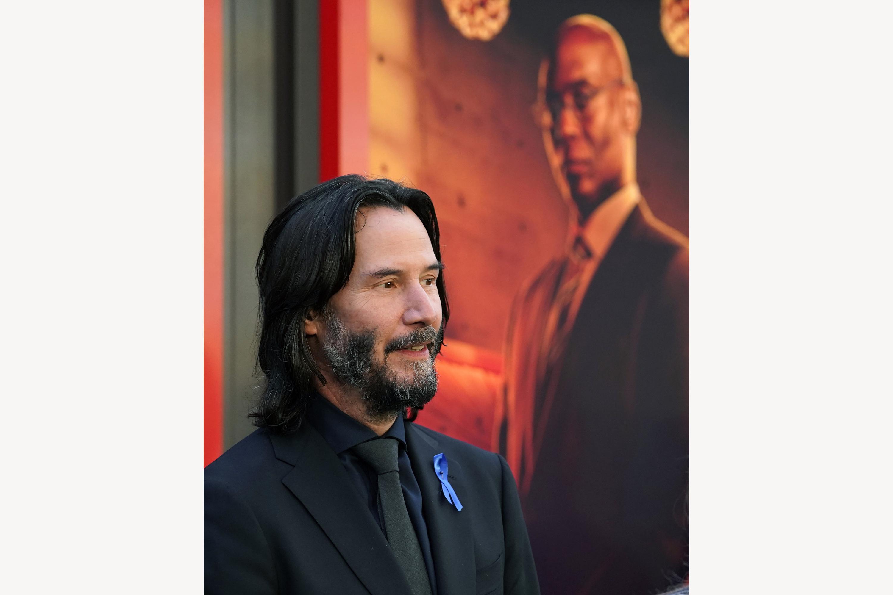 Keanu Reeves honors Lance Reddick at 'John Wick: Chapter 4