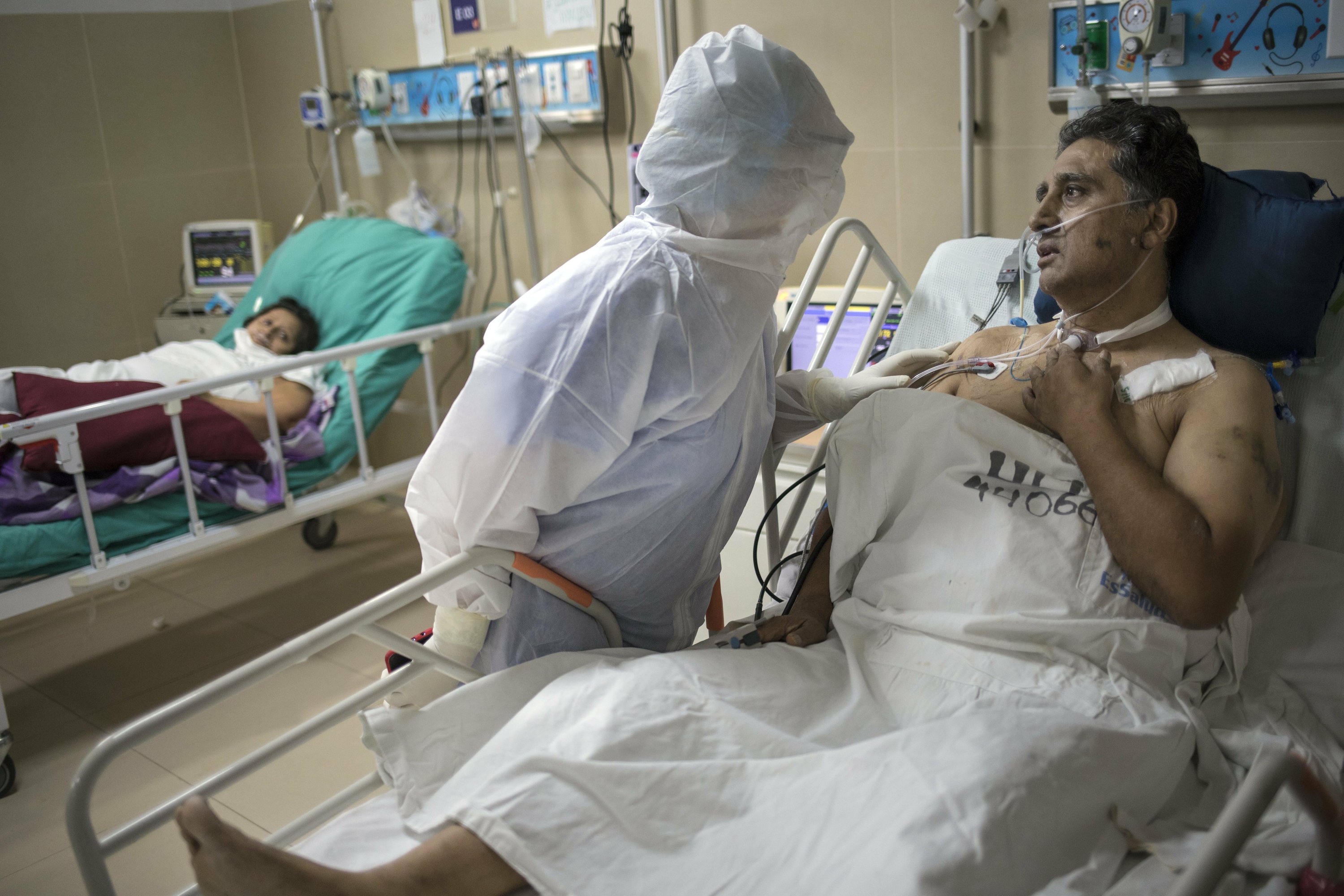 Zero cases in China as virus surges in Latin America, India