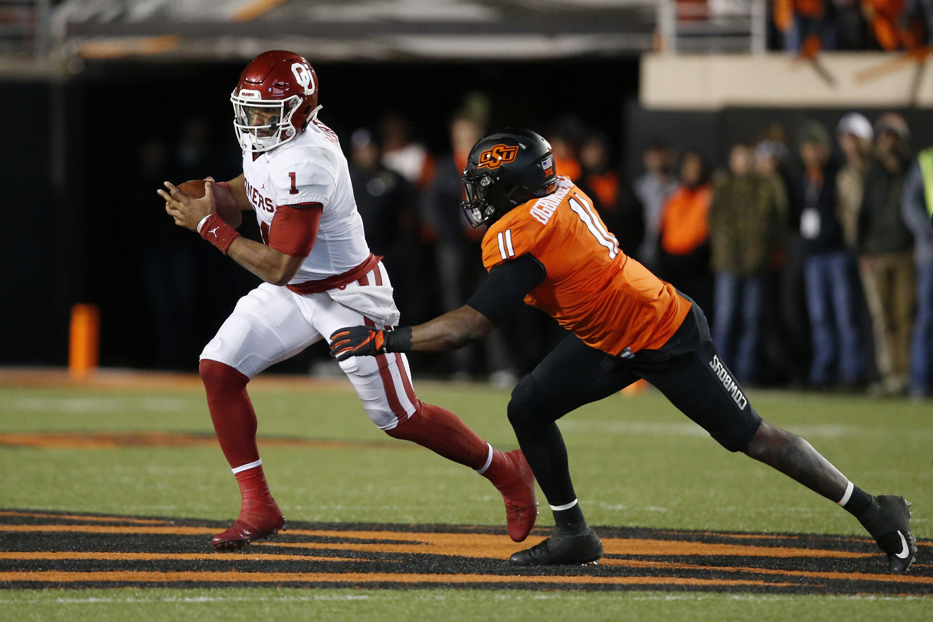 Oklahoma QB Hurts, Baylor QB Brewer create havoc as runners AP News