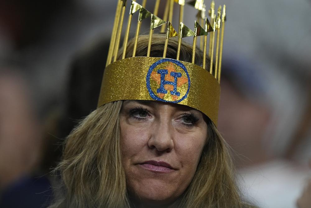 A Houston Astros fans watches during the seventh inning in Game 6 of baseball's World Series between the Houston Astros and the Atlanta Braves Tuesday, Nov. 2, 2021, in Houston. (AP Photo/David J. Phillip)