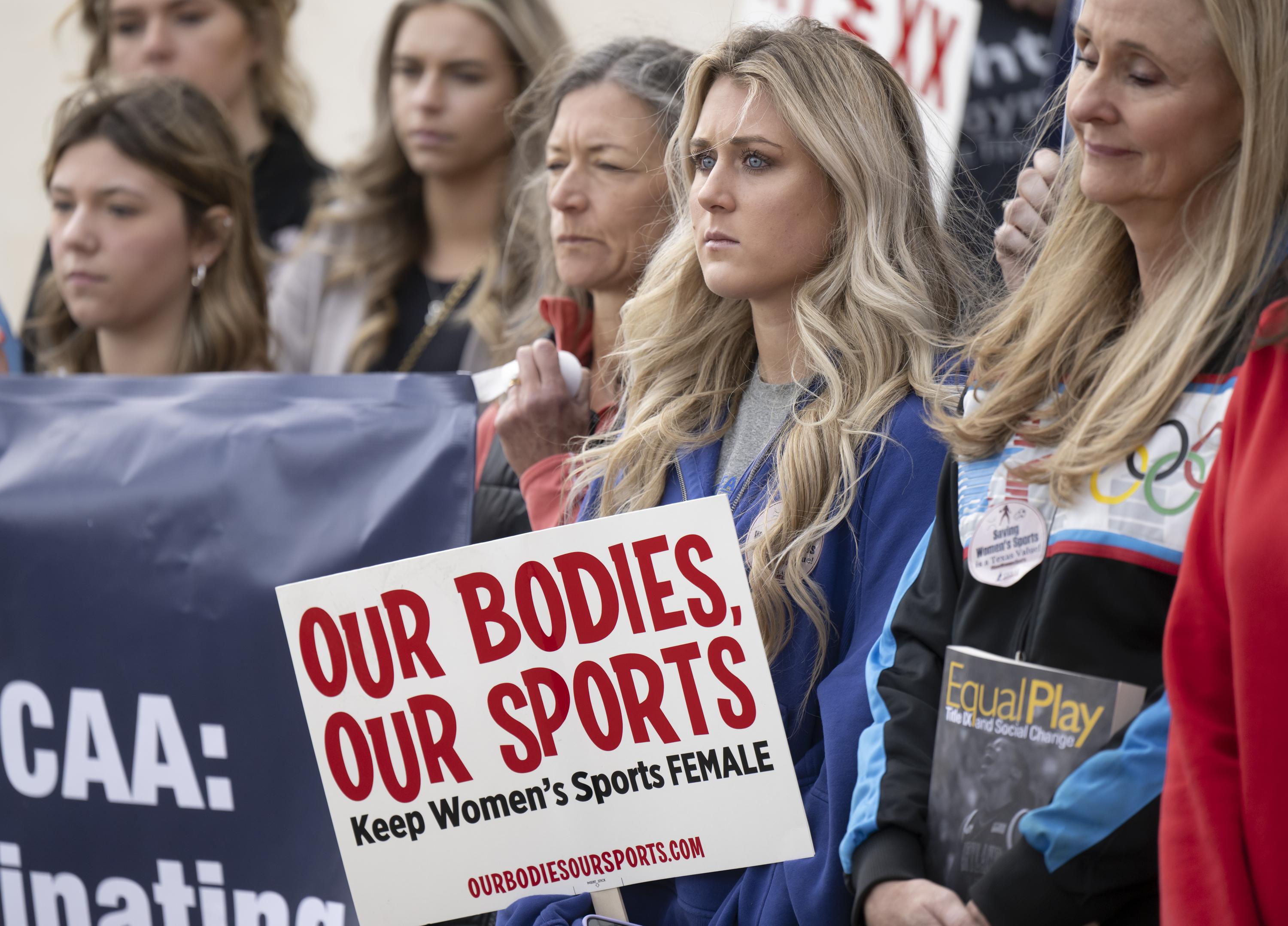 Protesters rally against transgender athletes outside NCAA convention