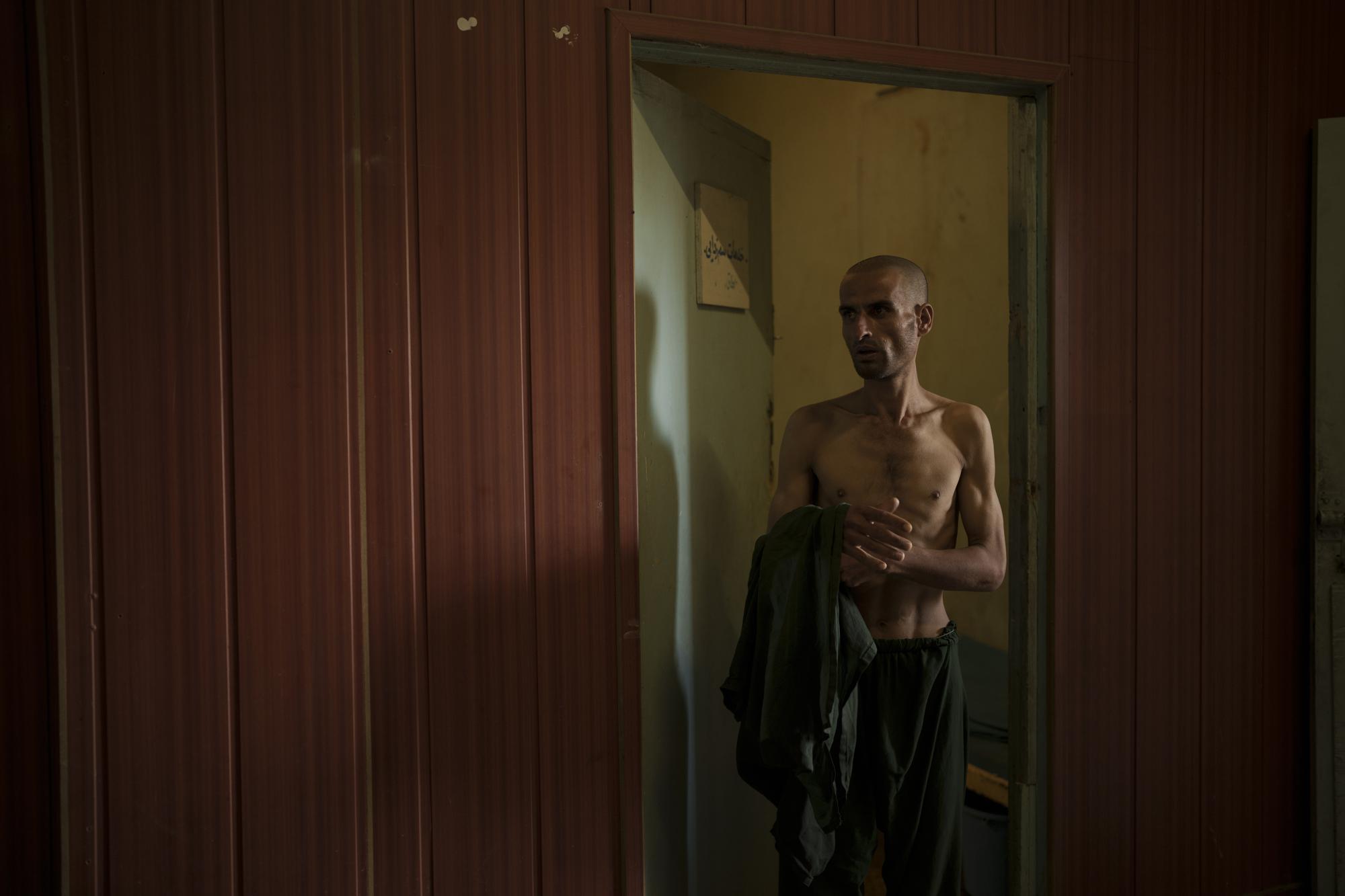Taliban invokes Islam to weed out drugs from Afghanistan war begins with shaved heads for addicts