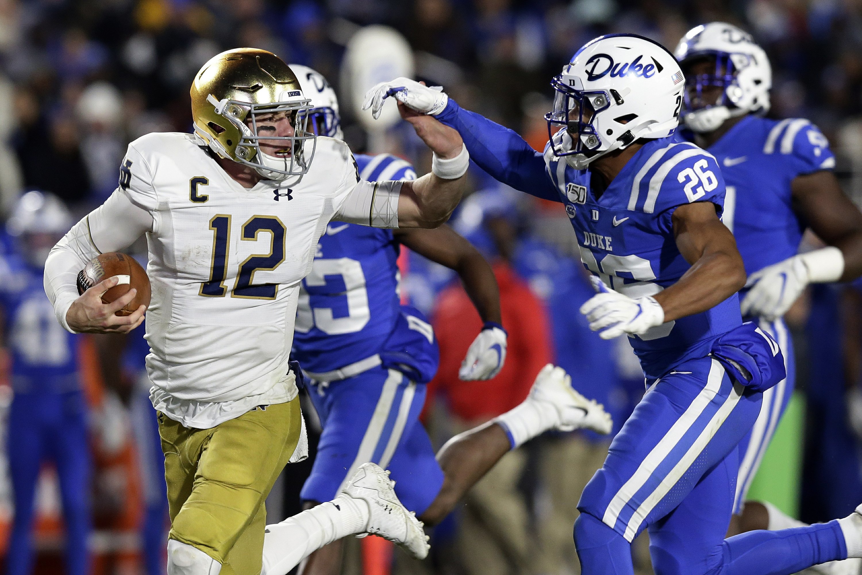 Book throws 4 TDs, No. 15 Notre Dame routs Duke 387 AP News