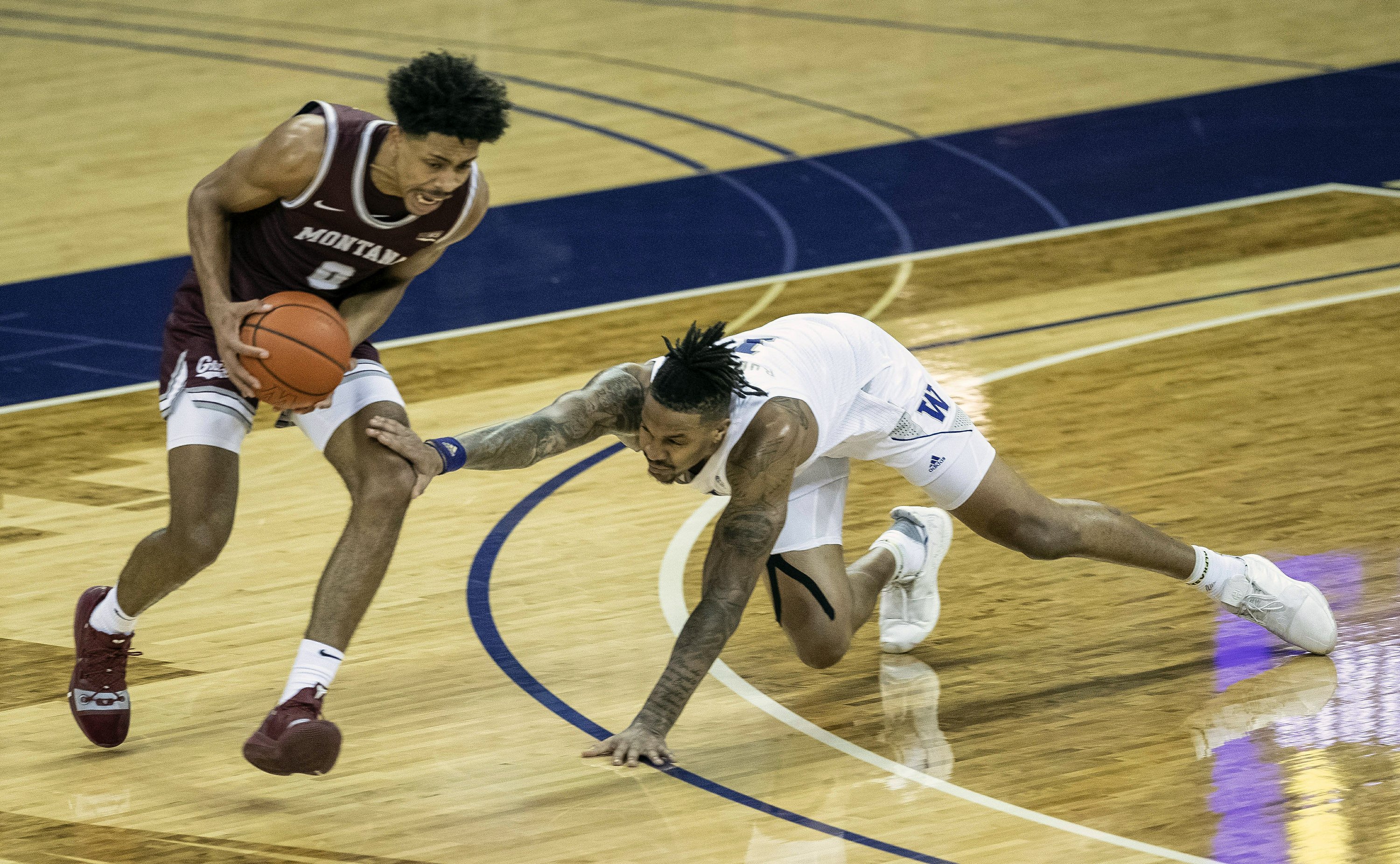 Montana pulls away late, stuns Washington 66-58 - Vimarsana News