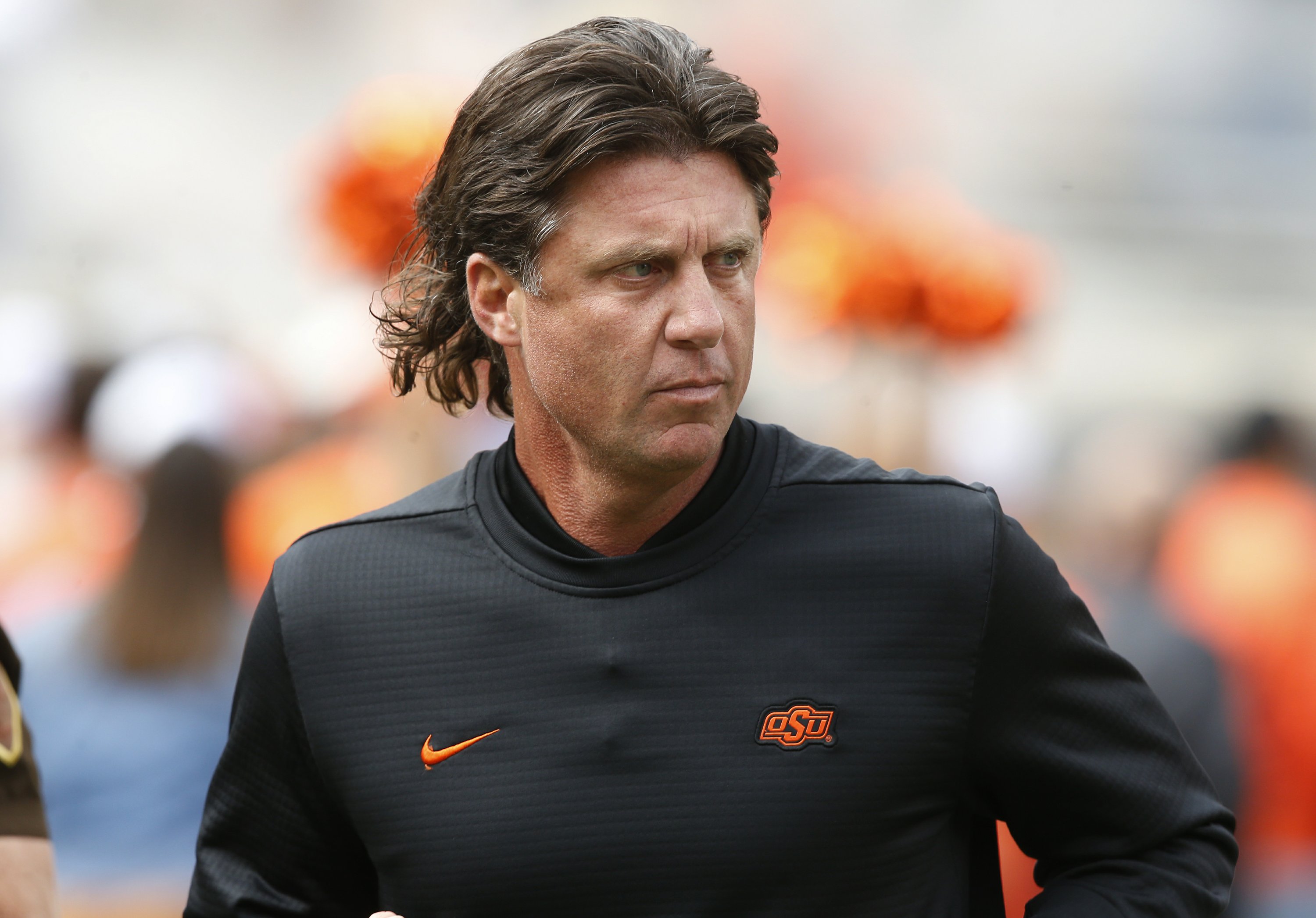 Oklahoma State's Gundy takes pay cut in wake of T-shirt flap | AP News