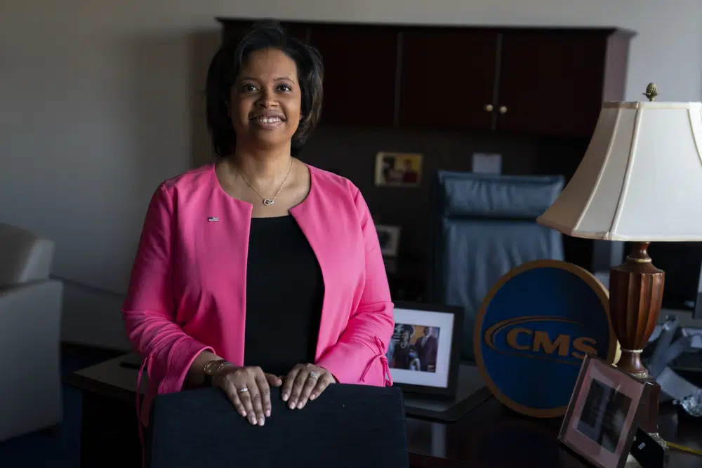 FILE - Chiquita Brooks-LaSure, the Administrator for the Centers of Medicare and Medicaid Services, poses for a photograph in her office, Feb. 9, 2022, in Washington. The federal government is cracking down on nursing homes' abuse of antipsychotic drugs after an investigation in 2022 revealed an overwhelming majority of their residents are prescribed the medication. The Centers for Medicaid and Medicare Services will begin sending investigators to certain facilities in January 2023 to audit nursing homes' diagnoses of schizophrenia in patients.(AP Photo/Evan Vucci, File)