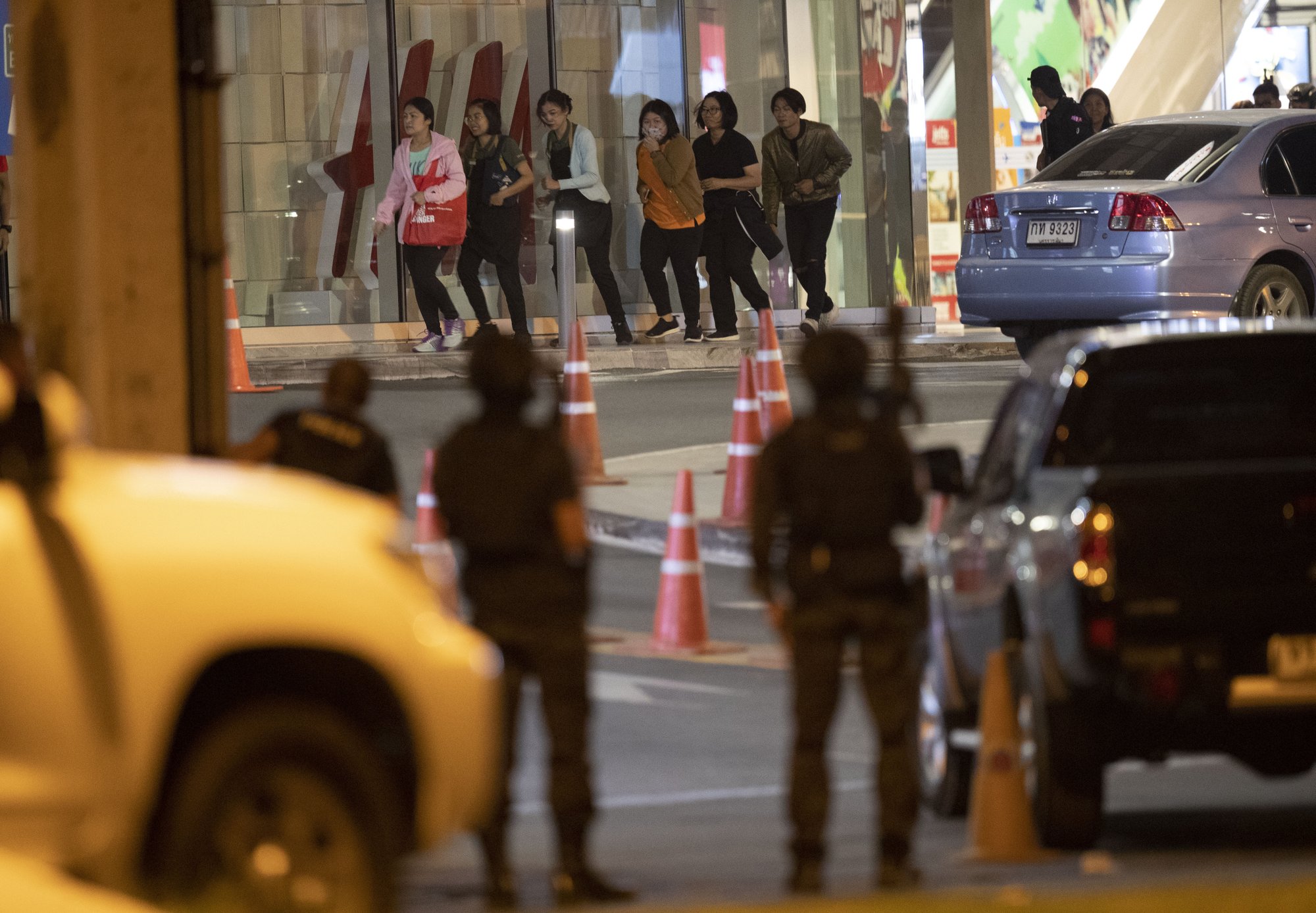 21 dead 31 hurt in thai mass shooting gunman hides in mall hurt in thai mass shooting gunman