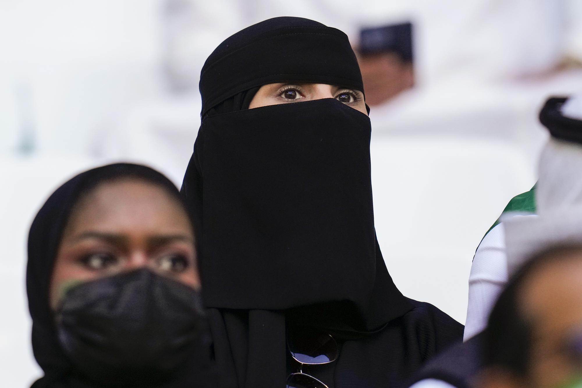 Saudi Arabian's fans wait for the World Cup group C soccer match between Poland and Saudi Arabia, at the Education City Stadium in Al Rayyan , Qatar, Saturday, Nov. 26, 2022. (AP Photo/Manu Fernandez)