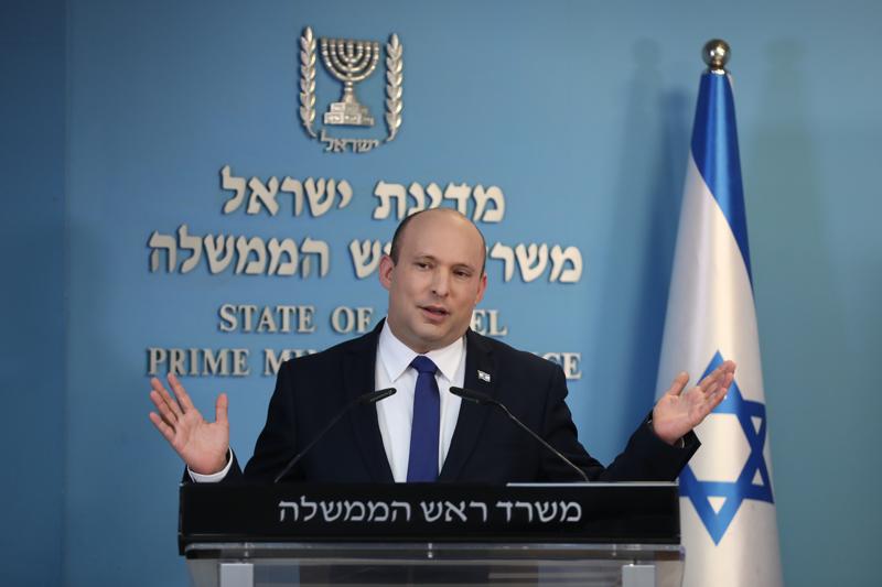 Israeli Prime Minister Naftali Bennett speaks during a news conference regarding COVID-19 pandemic in the country on Wednesday, Aug. 18, 2021 in Jerusalem. (Abir Sultan/Pool Photo via AP)