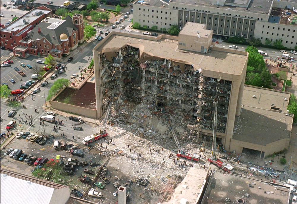 FILE - This April 19, 1995, file photo shows the north side of the Alfred Murrah Federal Building after a car bomb blast in Oklahoma City. Rescuers who responded to past disasters say the search for victims of the Florida condo collapse that occurred on June 24, 2021, brought back memories of the Oklahoma City bombing and the Sept. 11 attacks. (AP Photo, File)