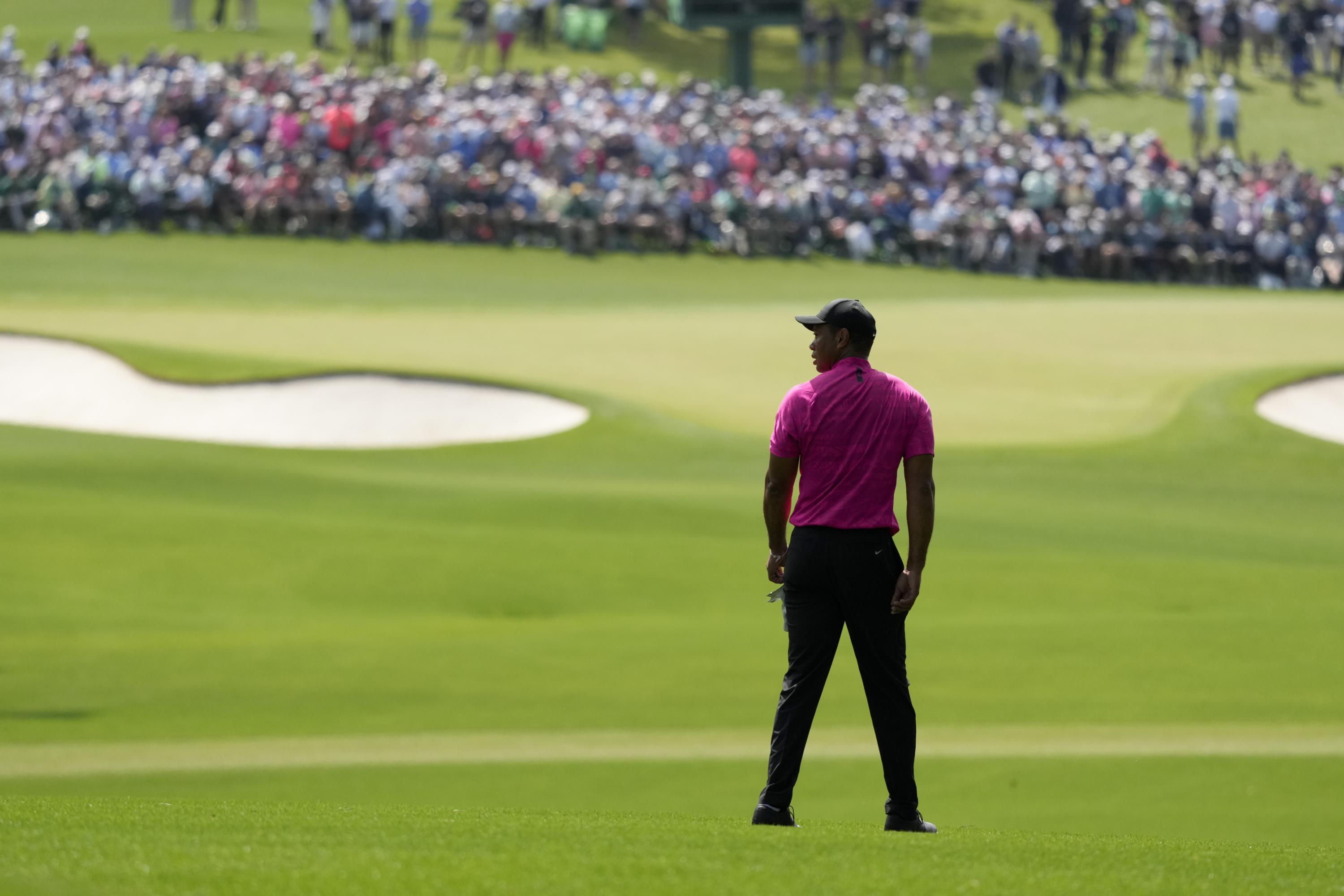 Masters Day 1: Tiger Woods returned, and order was restored | AP News