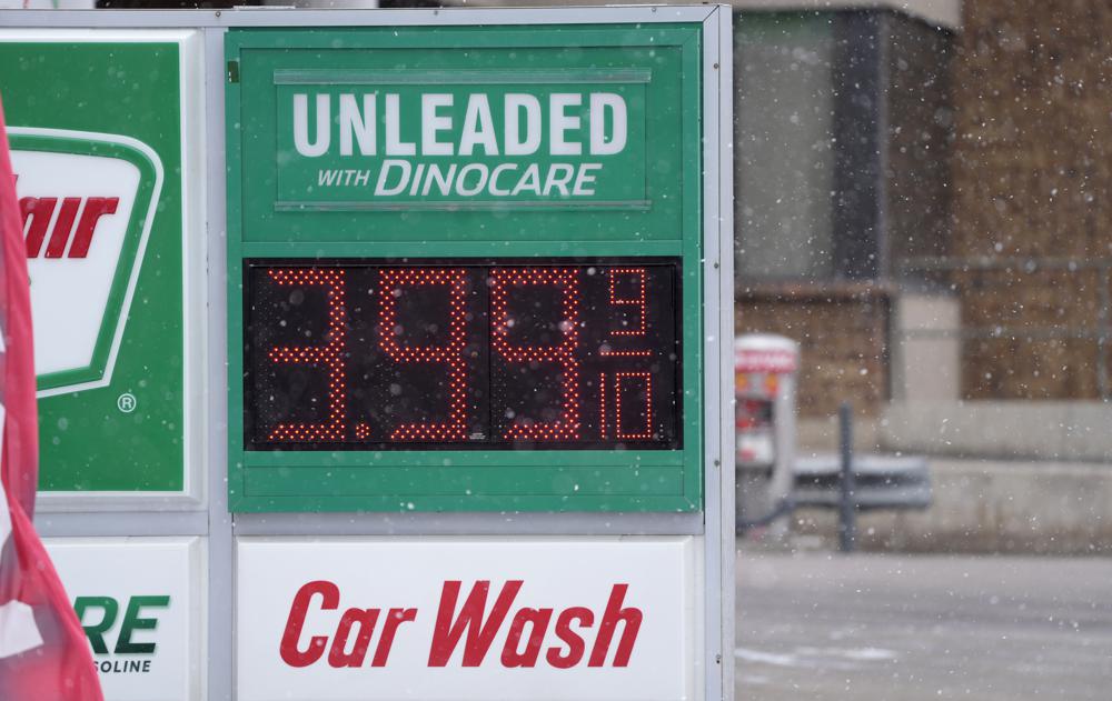 Price for a gallon of regular-grade gasoline is shown on a digital sign at a service station Wednesday, March 9, 2022, in Denver. (AP Photo/David Zalubowski)